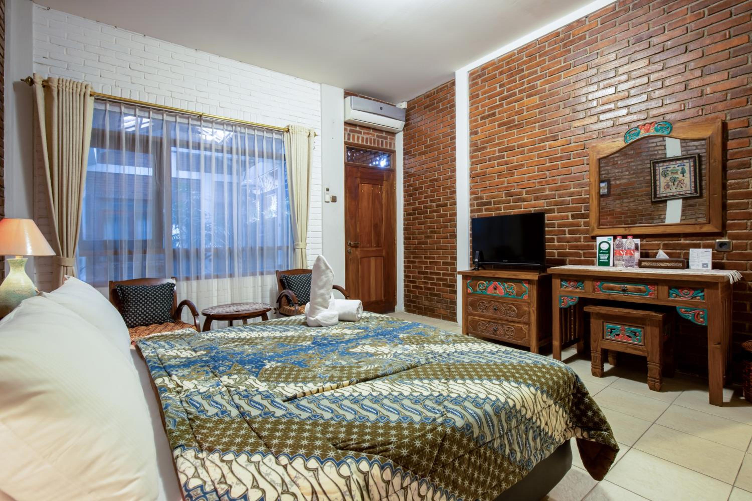 Deluxe Room - Photo 7