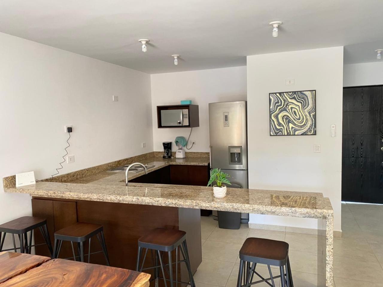 Three-Bedroom House - Photo 18