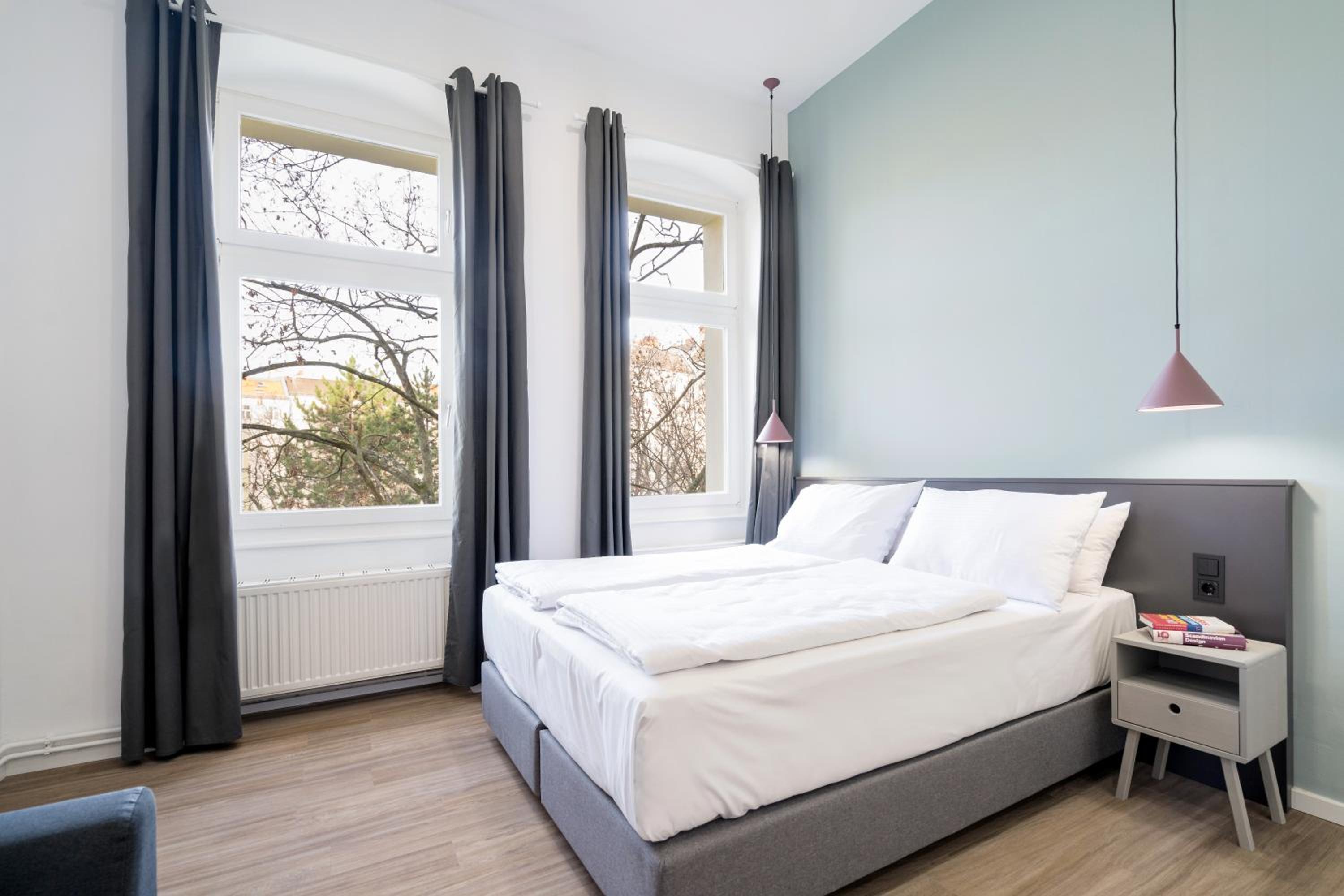 Four-Bedroom Apartment with Balcony	 photo 2