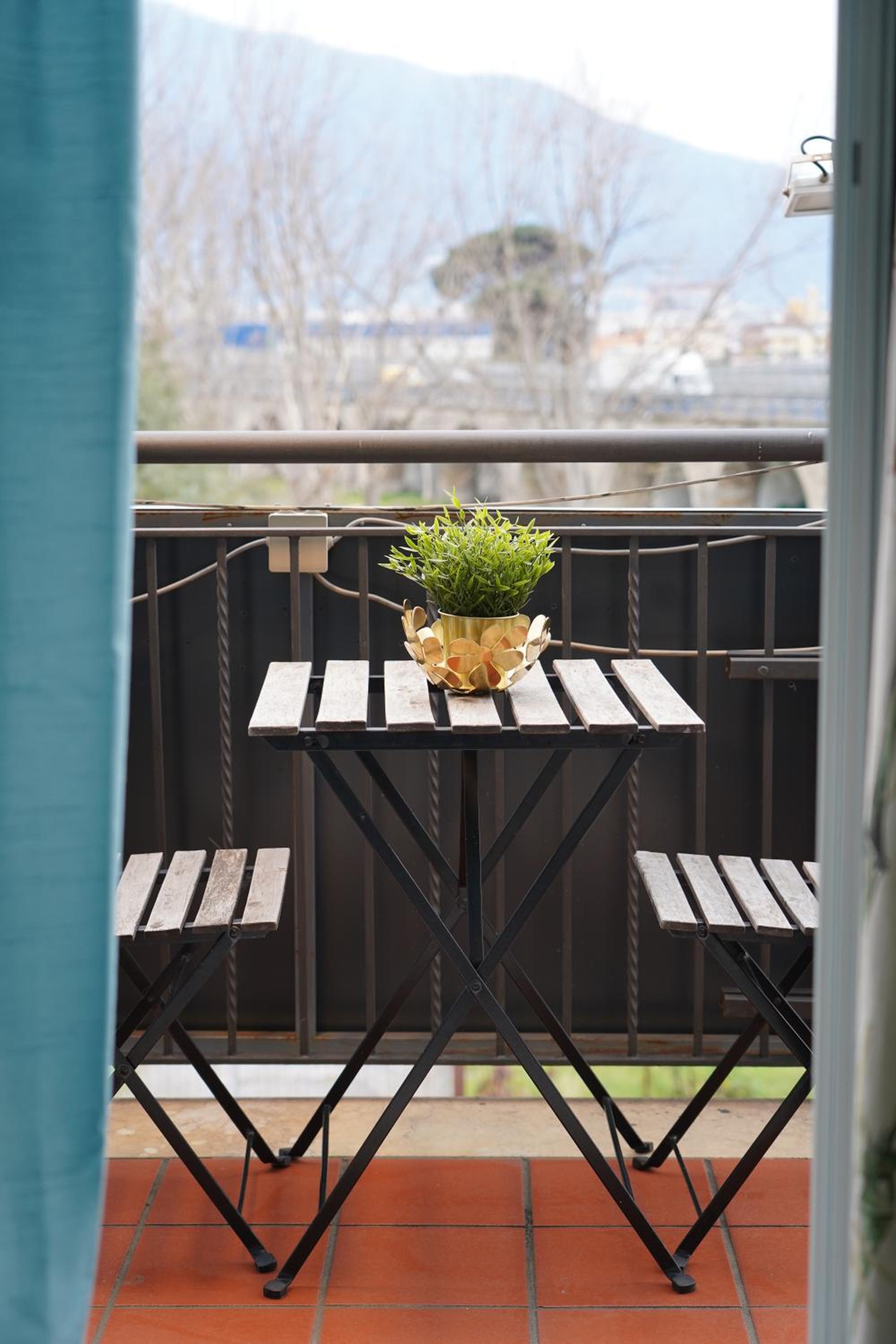 Quadruple Room with Balcony - Photo 12