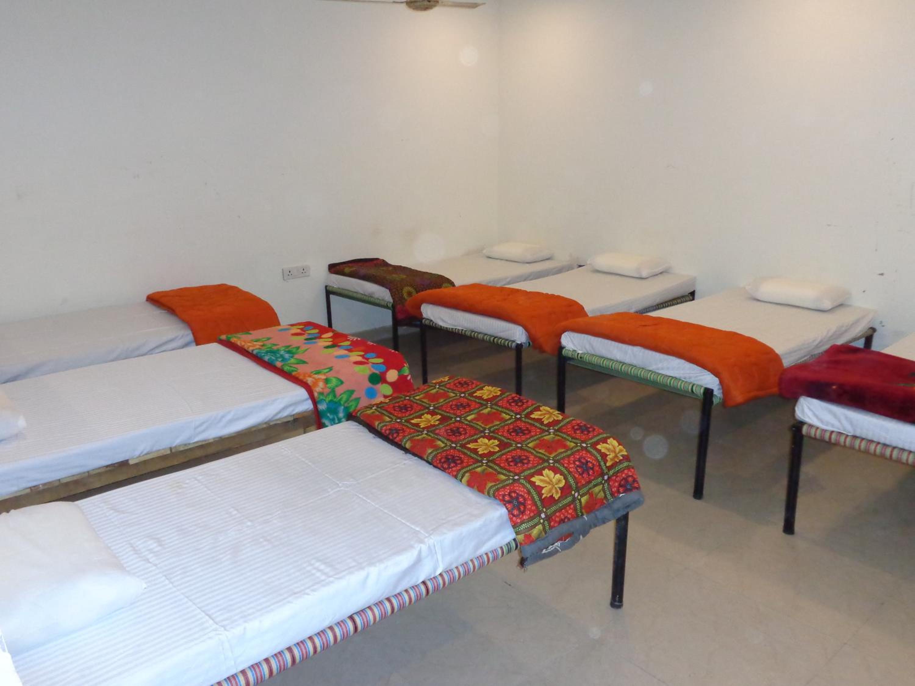 Bed In Male Dormitory Room