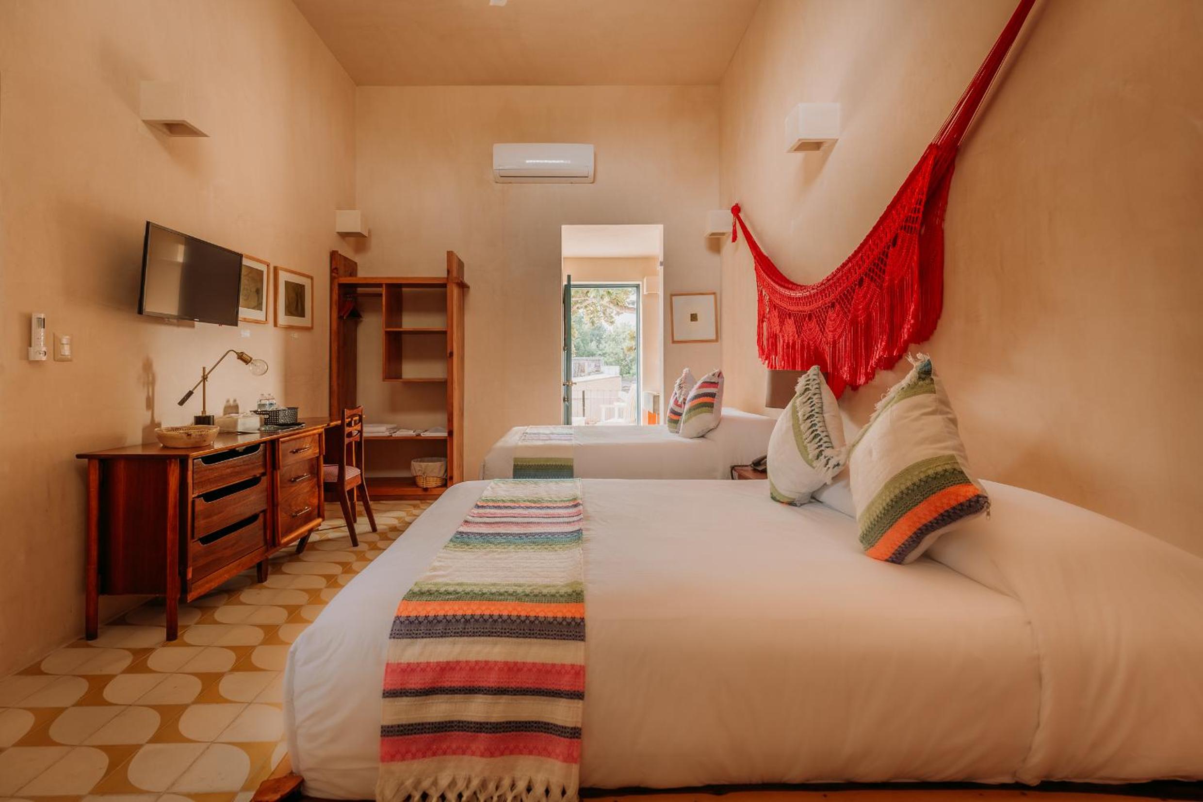 Deluxe Family Room with Balcony, Air Conditioning and Private Bathroom