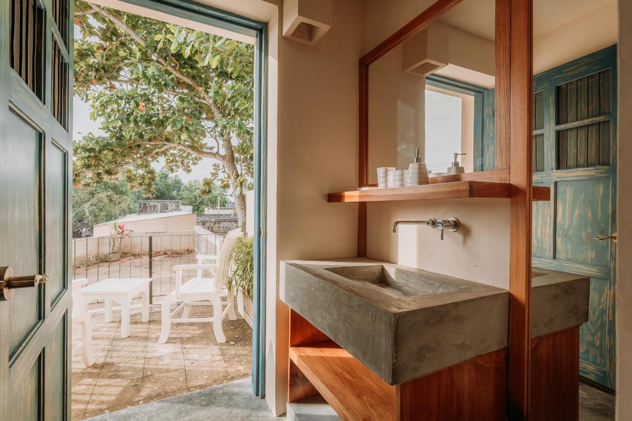 Deluxe Family Room with Balcony, Air Conditioning and Private Bathroom