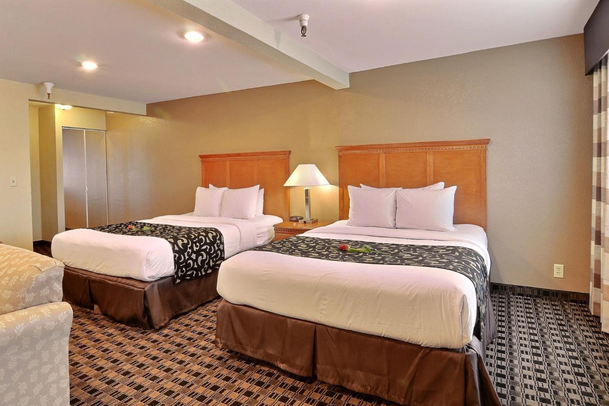 Queen Room with Two Queen Beds - Photo 1