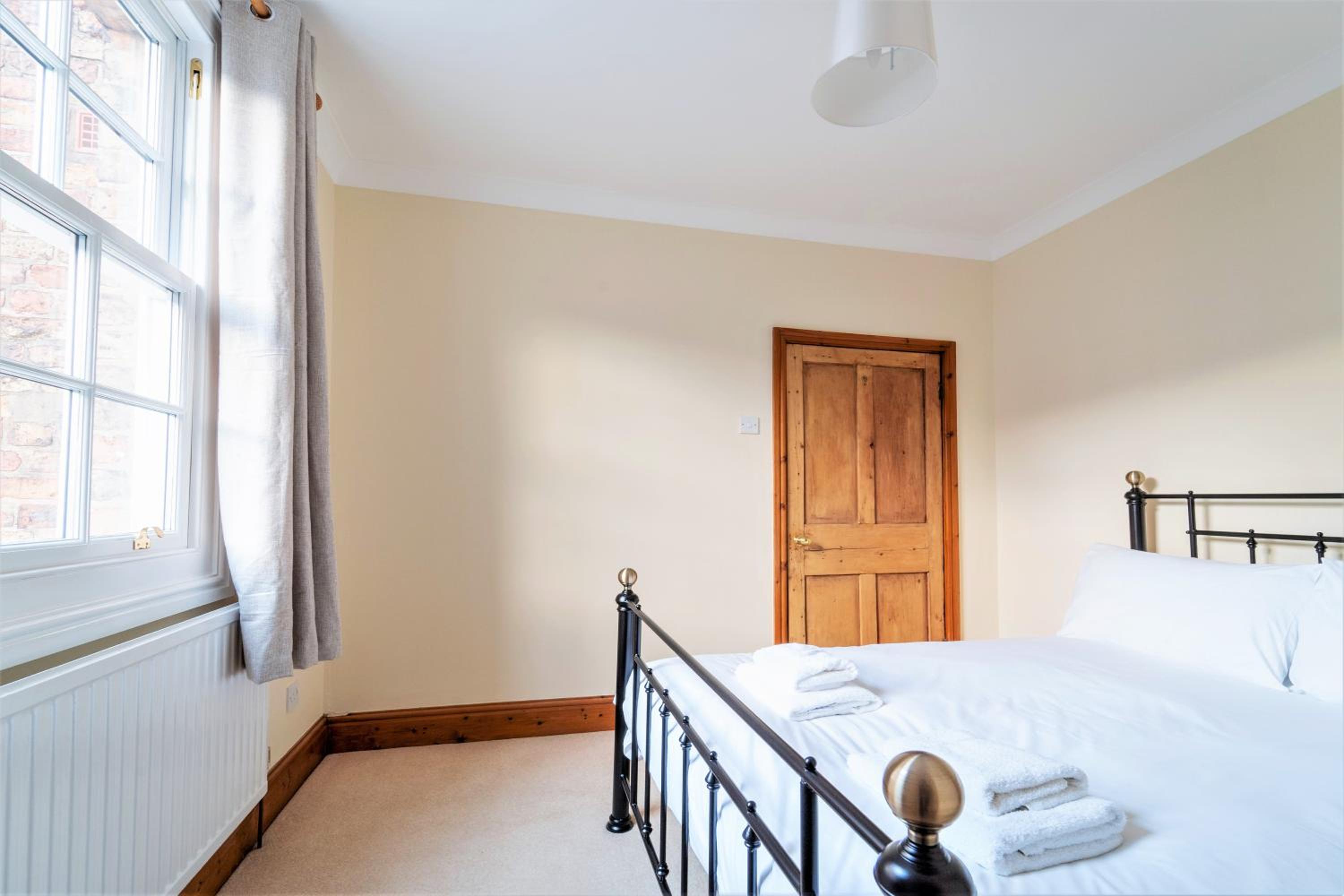 Three-Bedroom House - Photo 16
