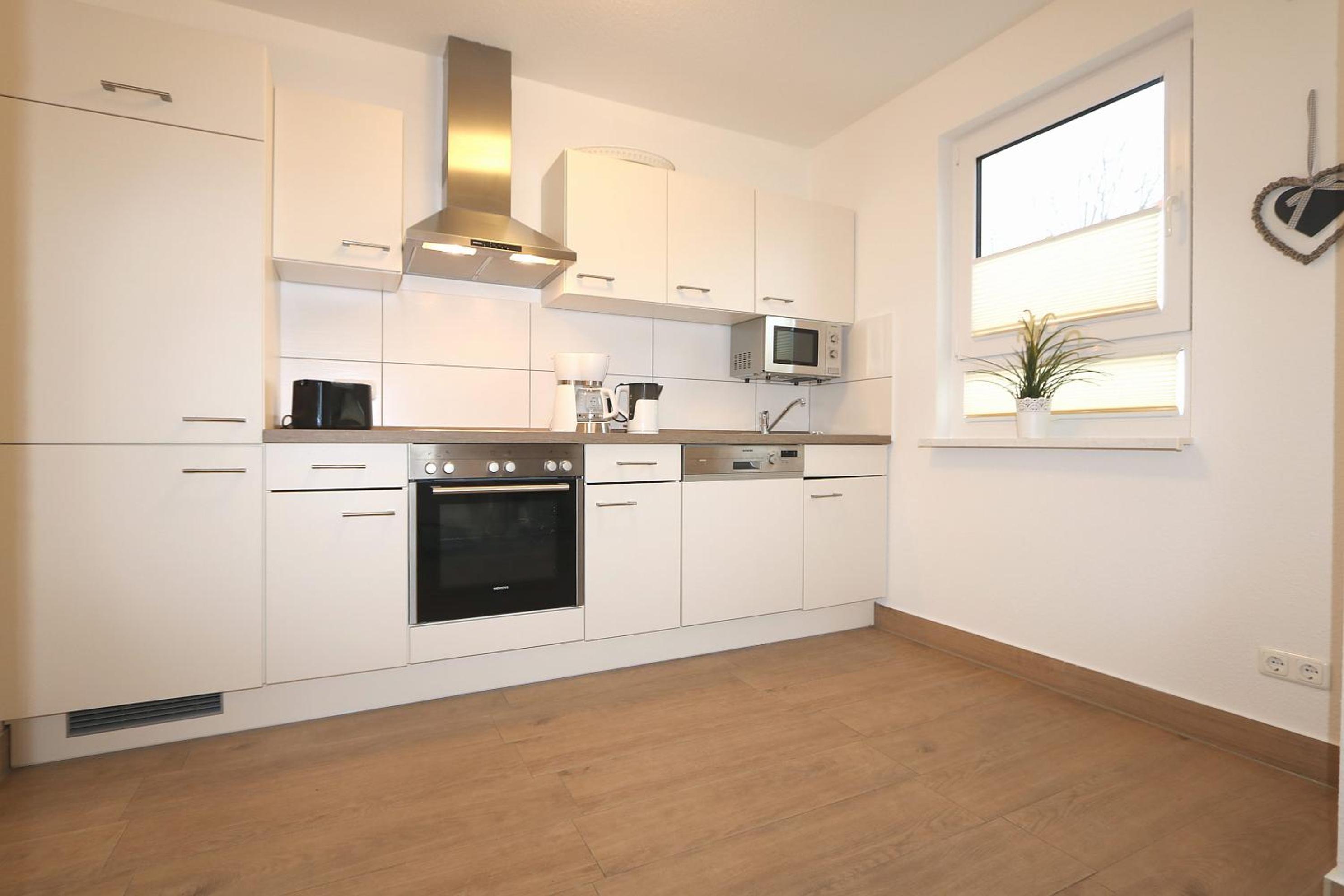 Three-Bedroom House - Photo 12