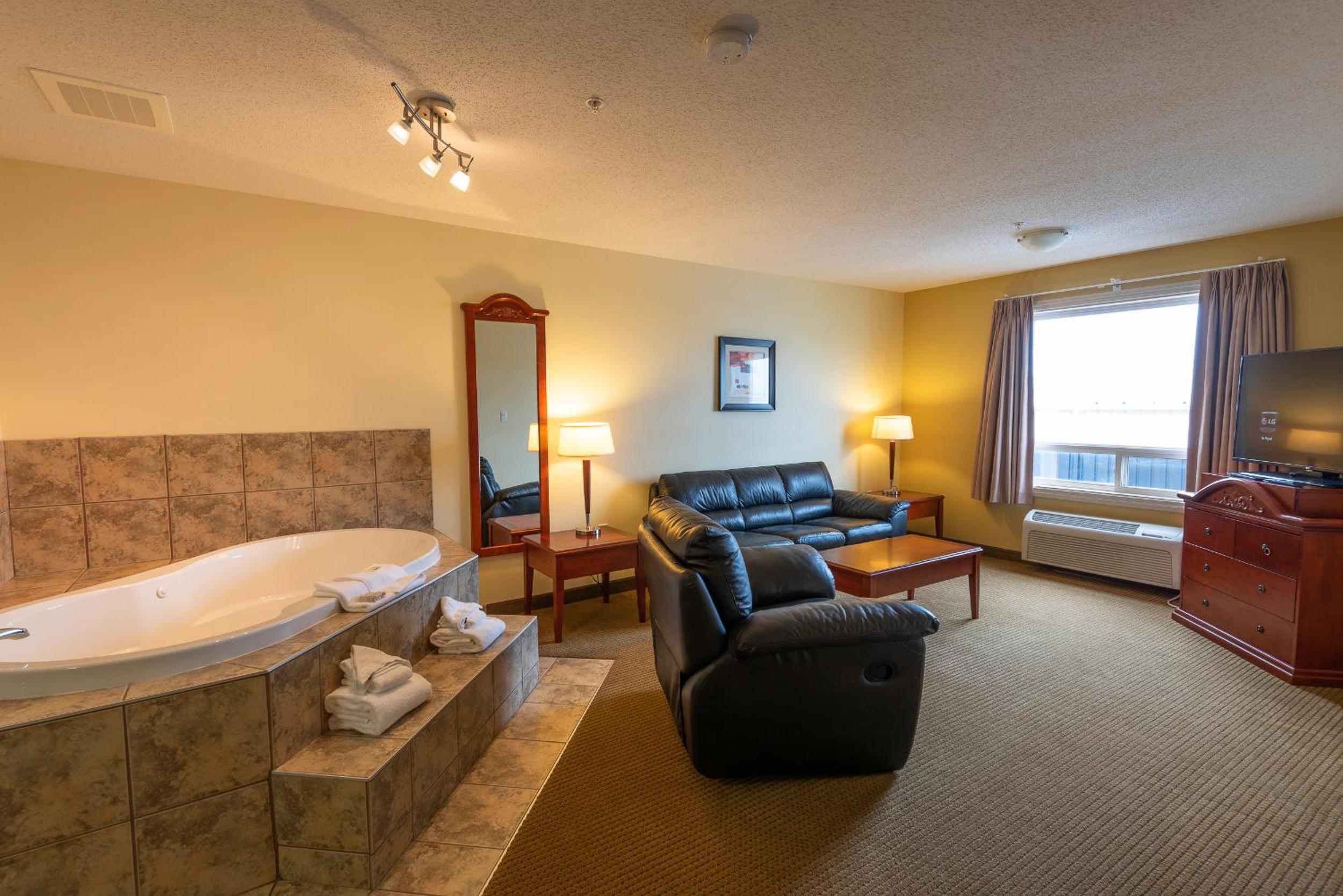 Family Suite with One King and One Queen Bed - Smoking - Photo 1