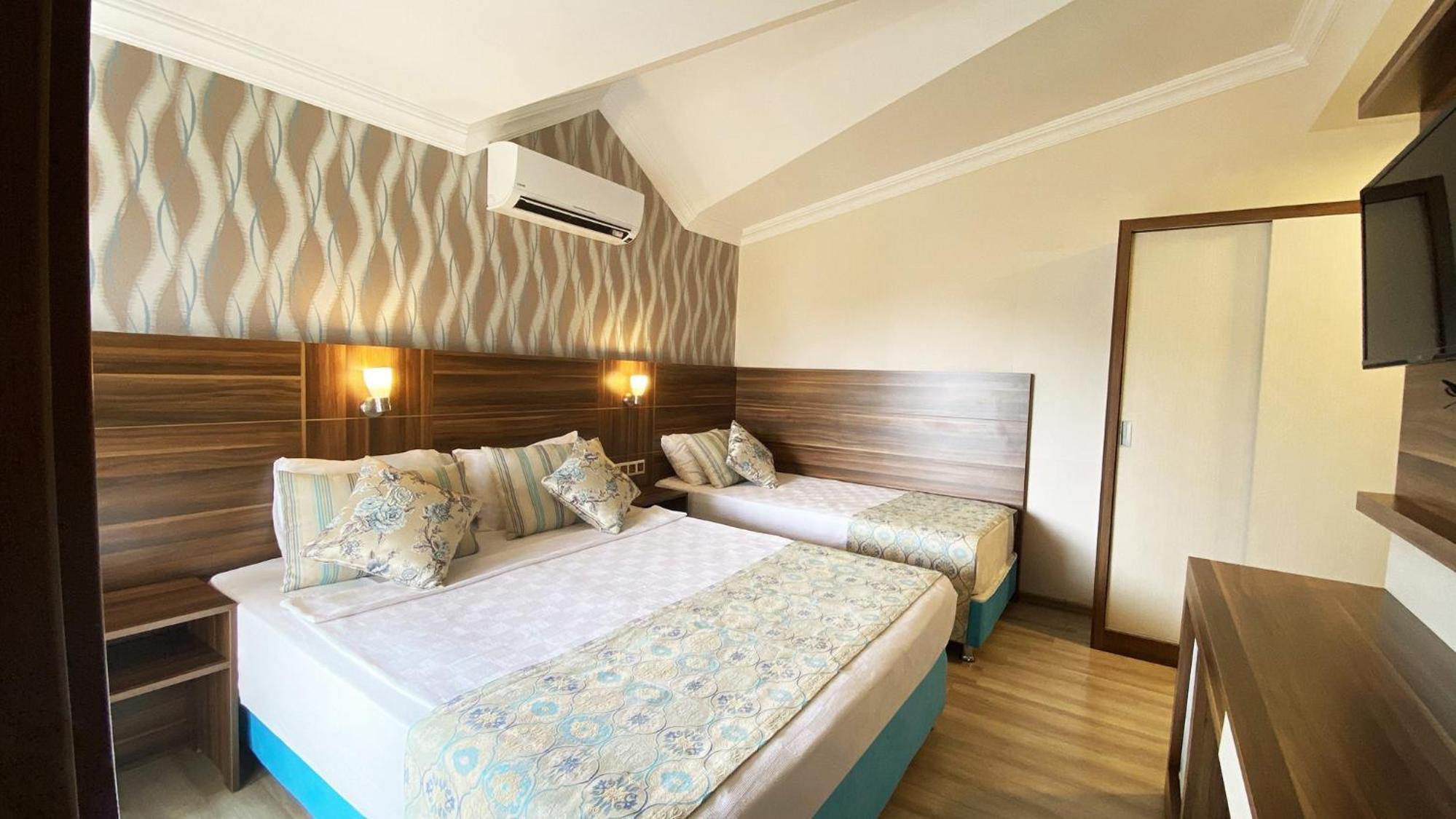 Standard Triple Room - Photo 2