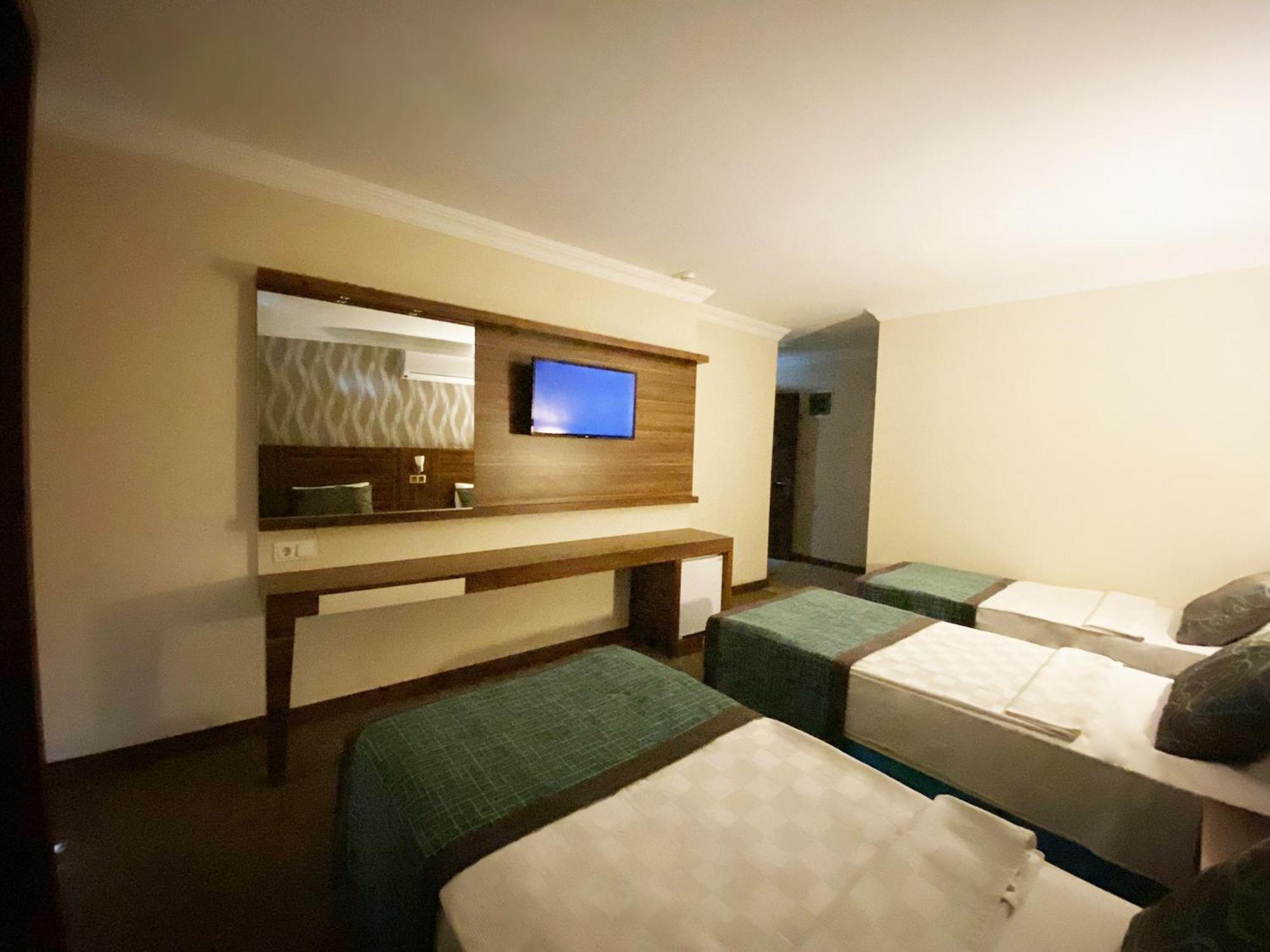 Standard Triple Room - Photo 1
