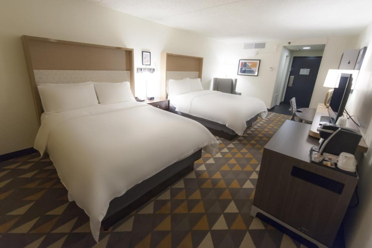 Premium Queen Room with Two Queen Beds - Photo 1
