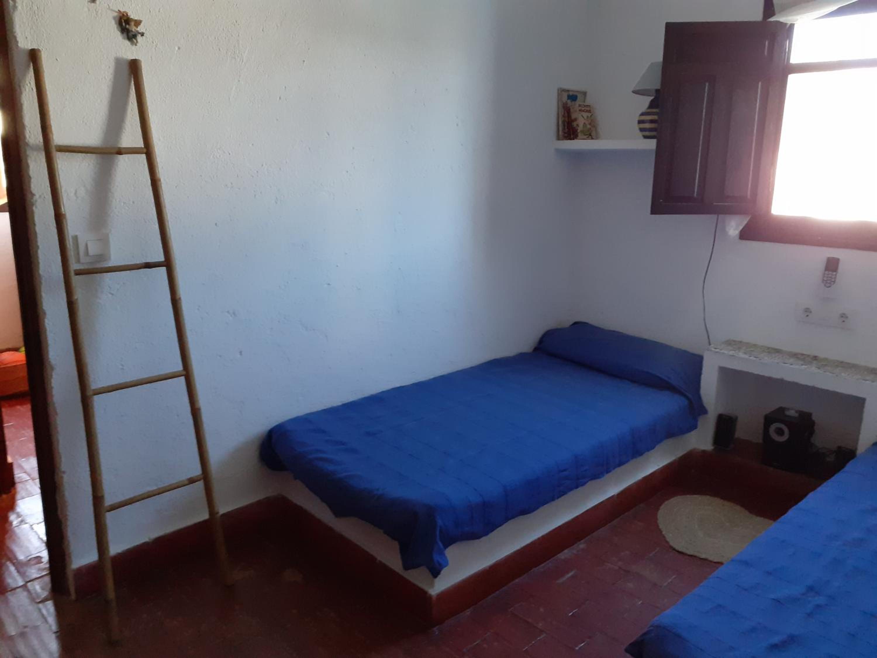 Casa de cuatro habitaciones