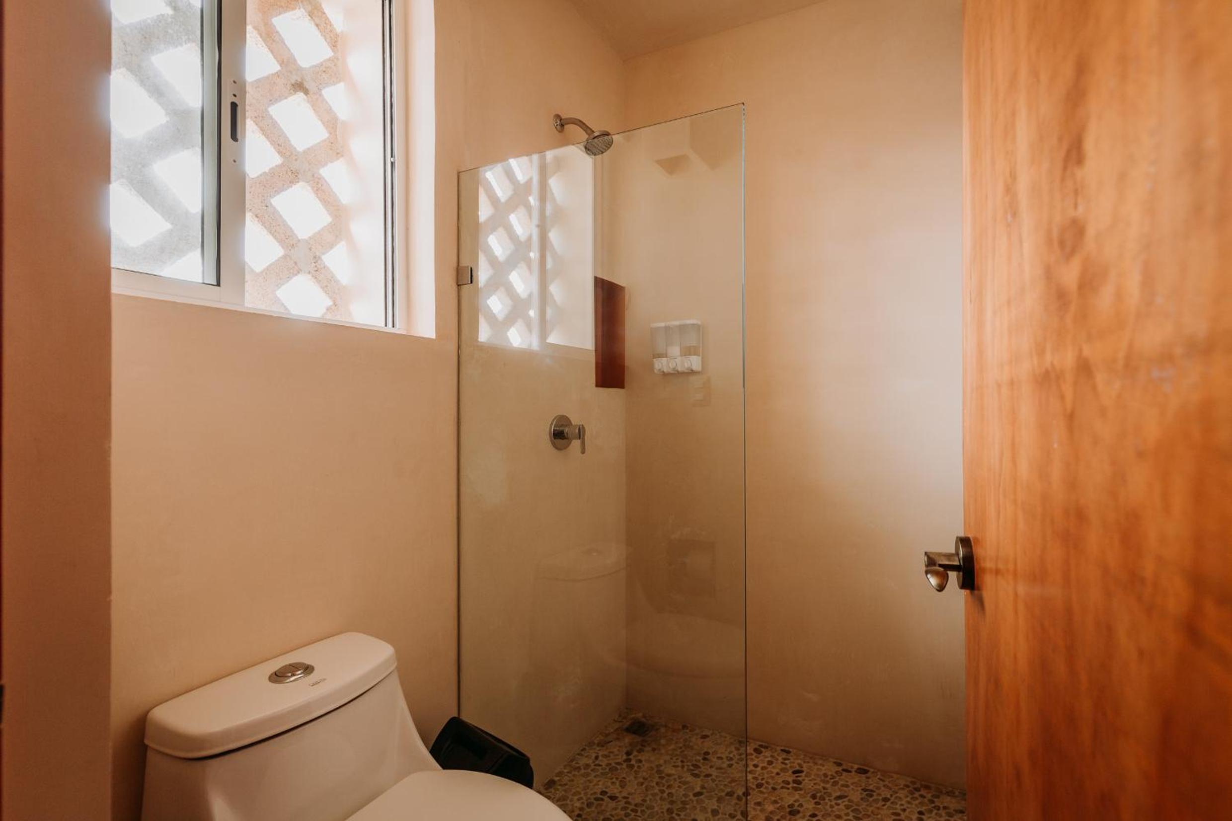 Deluxe Room with Balcony, Air Conditioning and Private Bathroom
