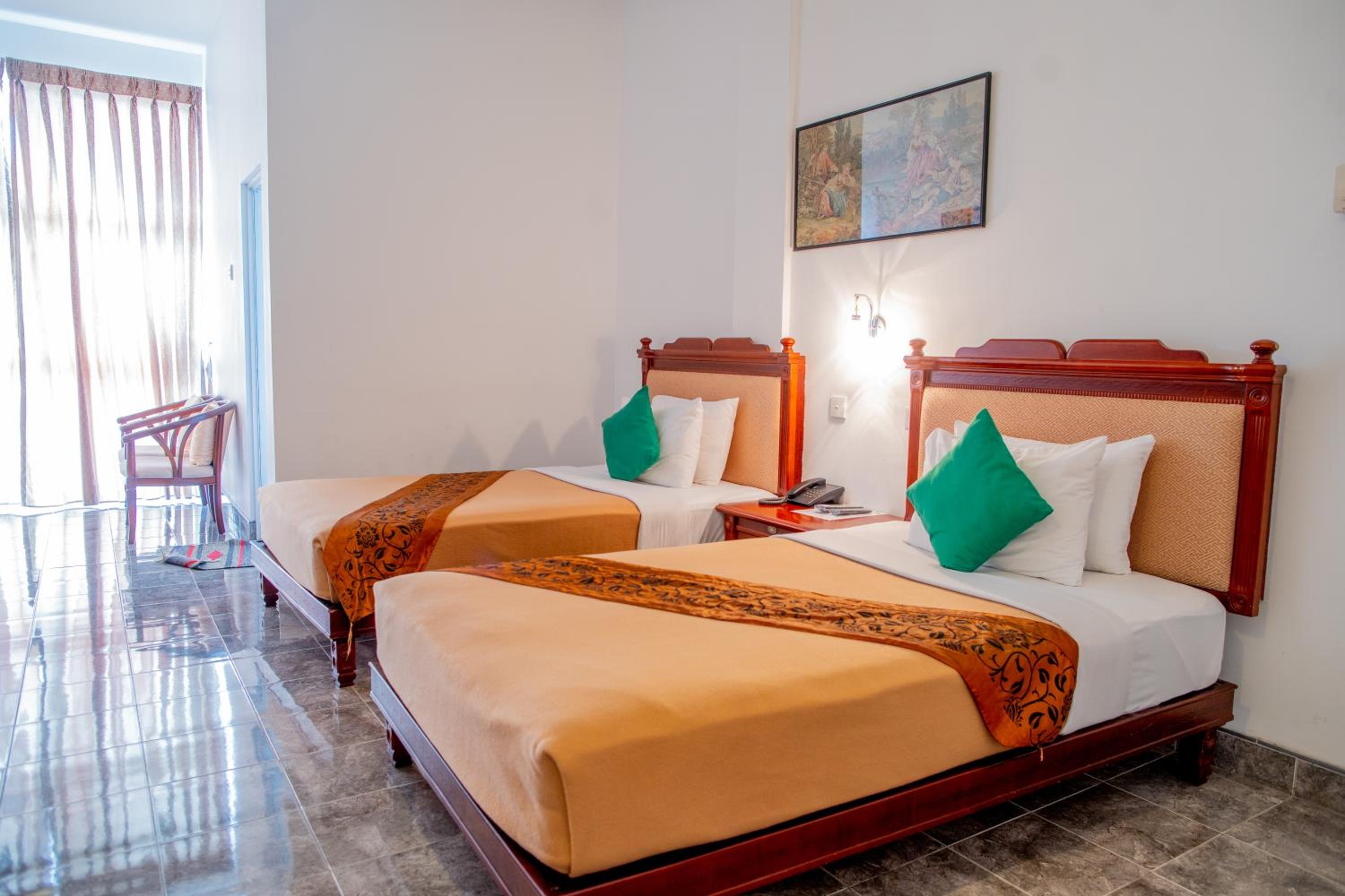 Deluxe Triple Room