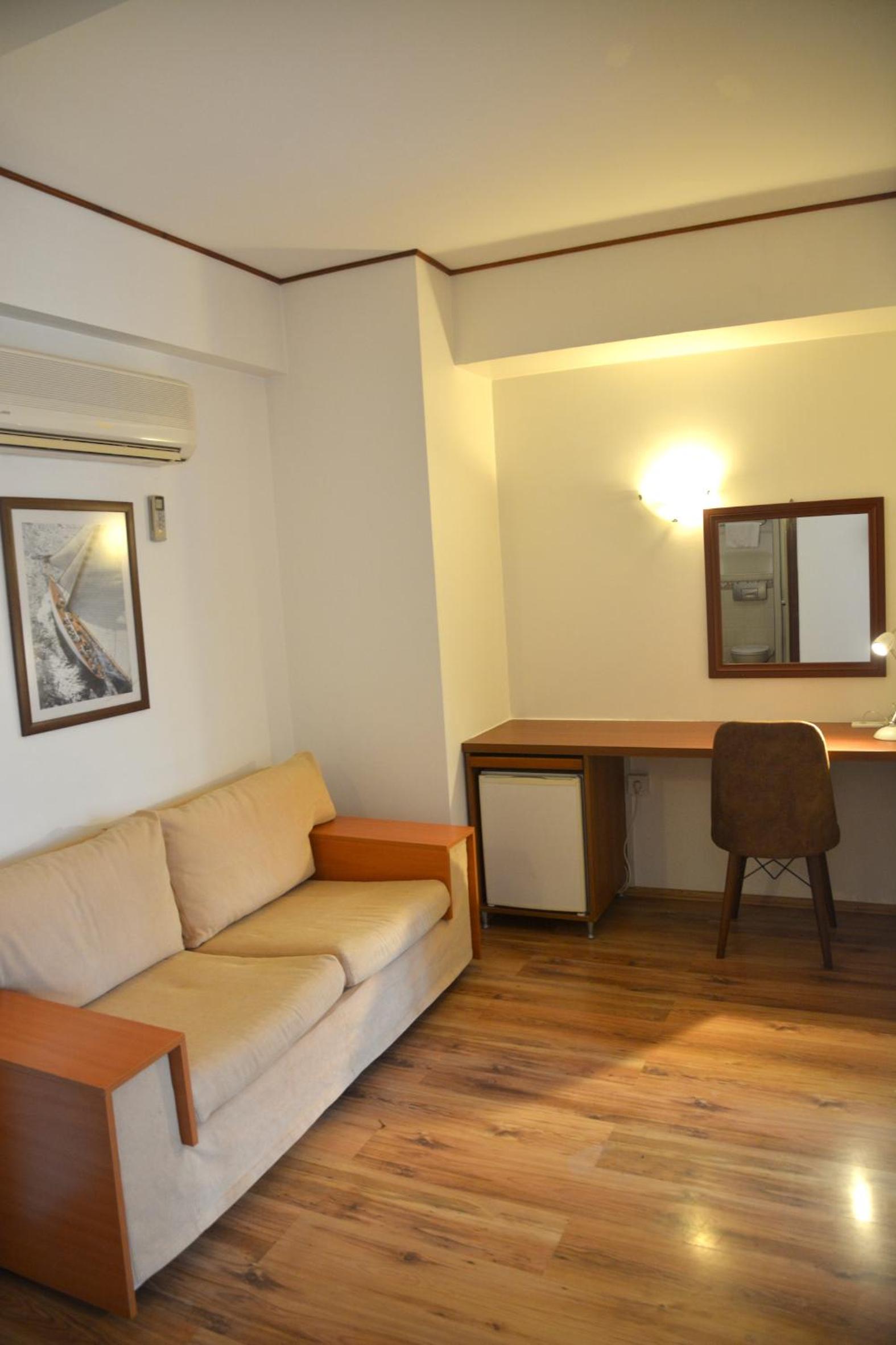 Deluxe Quadruple Room - Photo 10