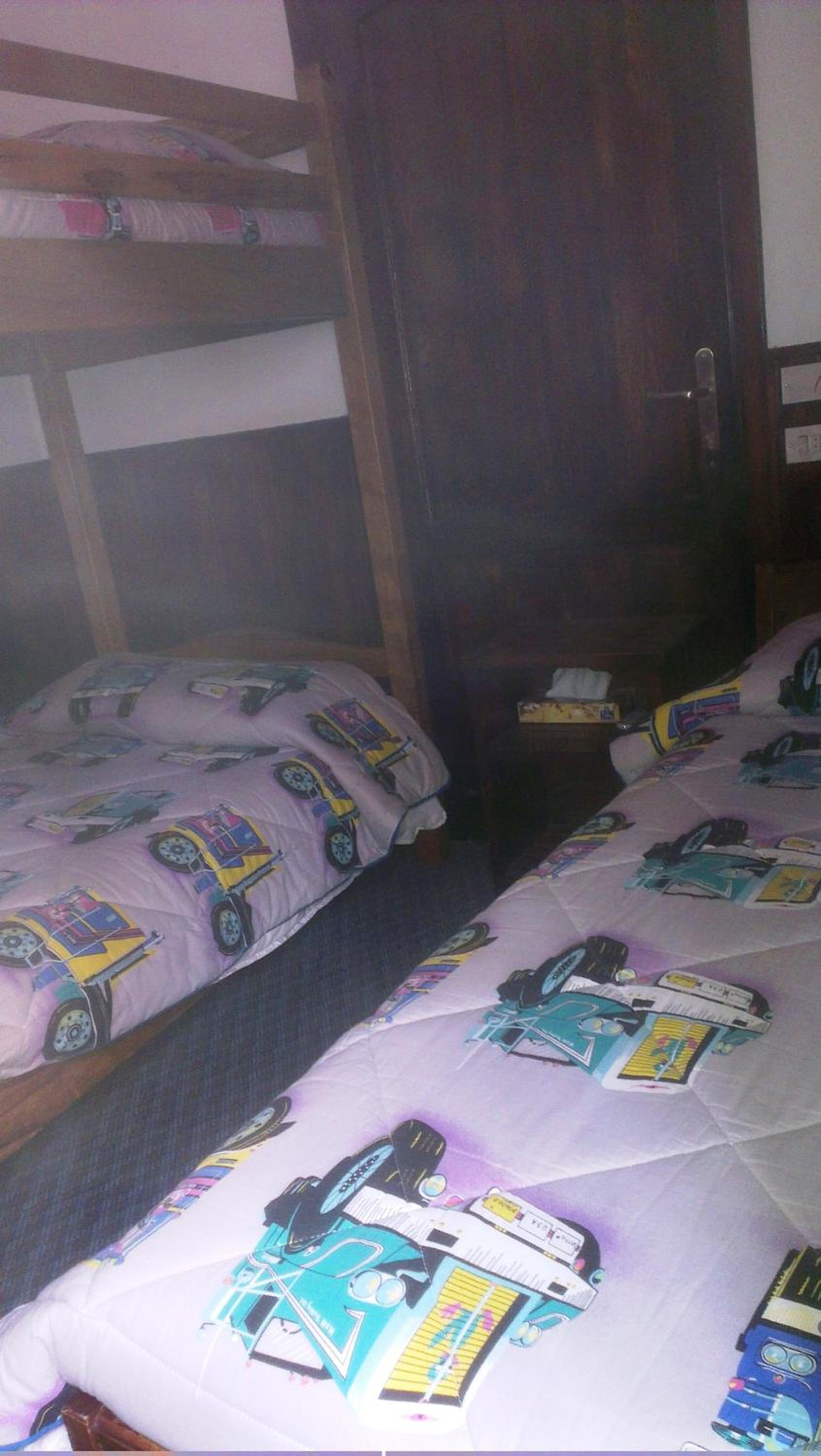 Economy Triple Room photo 3