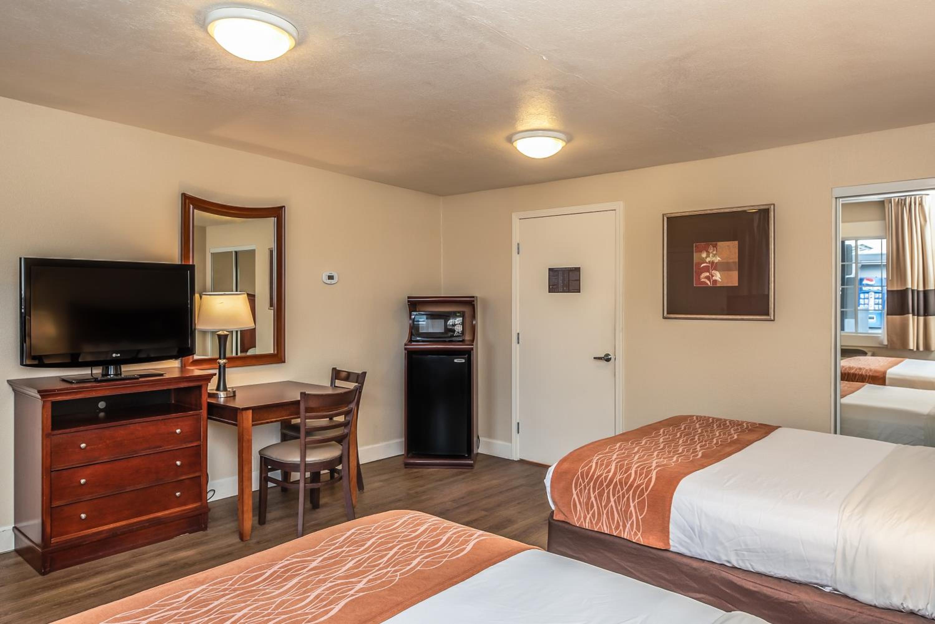 Queen Room with Two Queen Beds - Photo 1