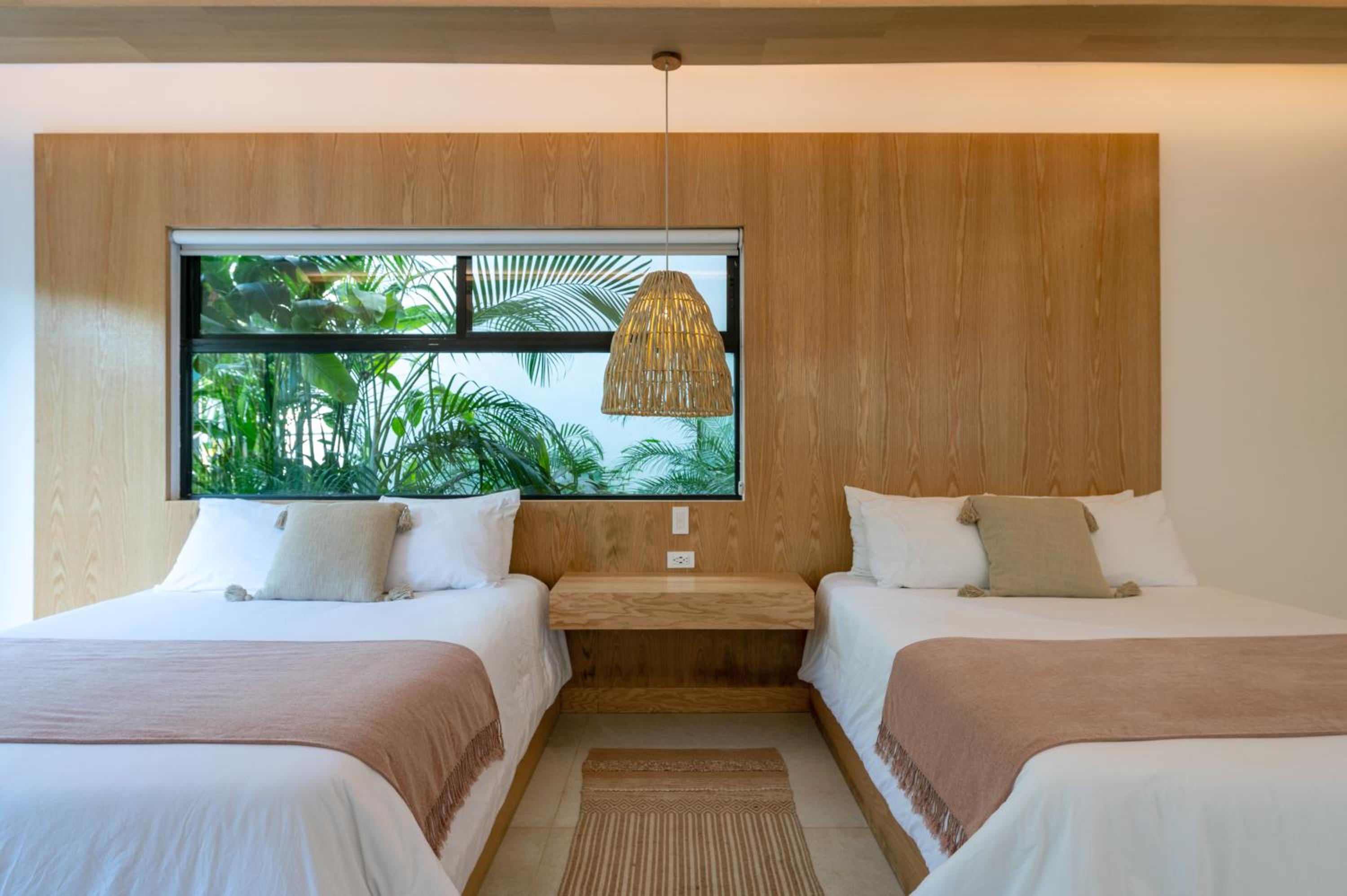 Deluxe Queen Room with Two Queen Beds - Photo 2