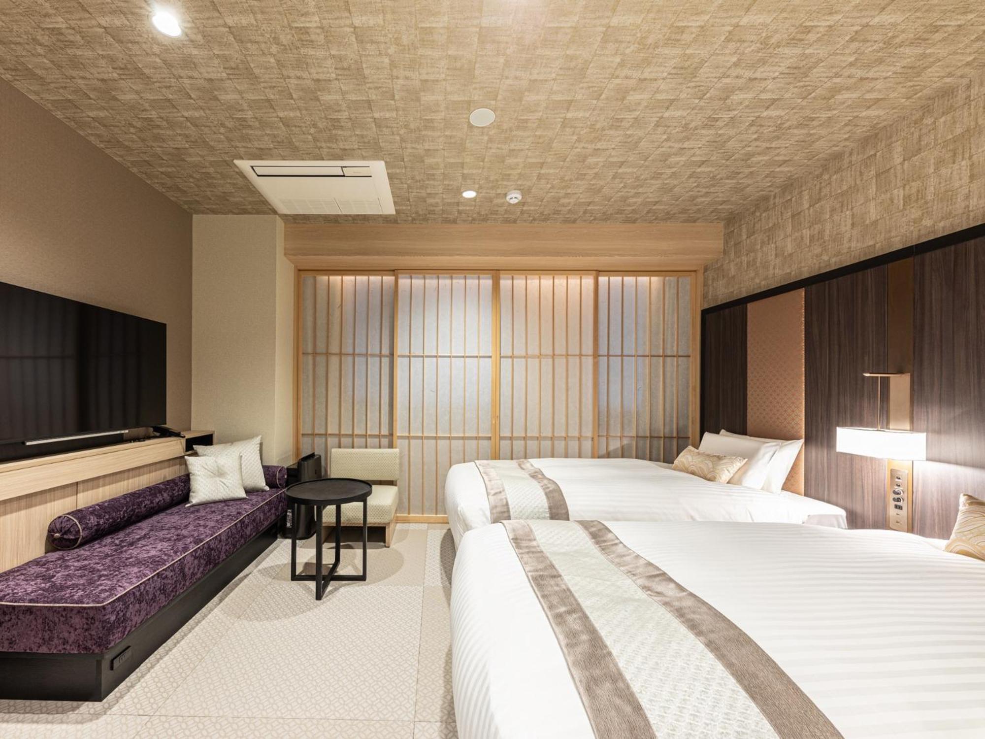 Deluxe Twin Room - Photo 8
