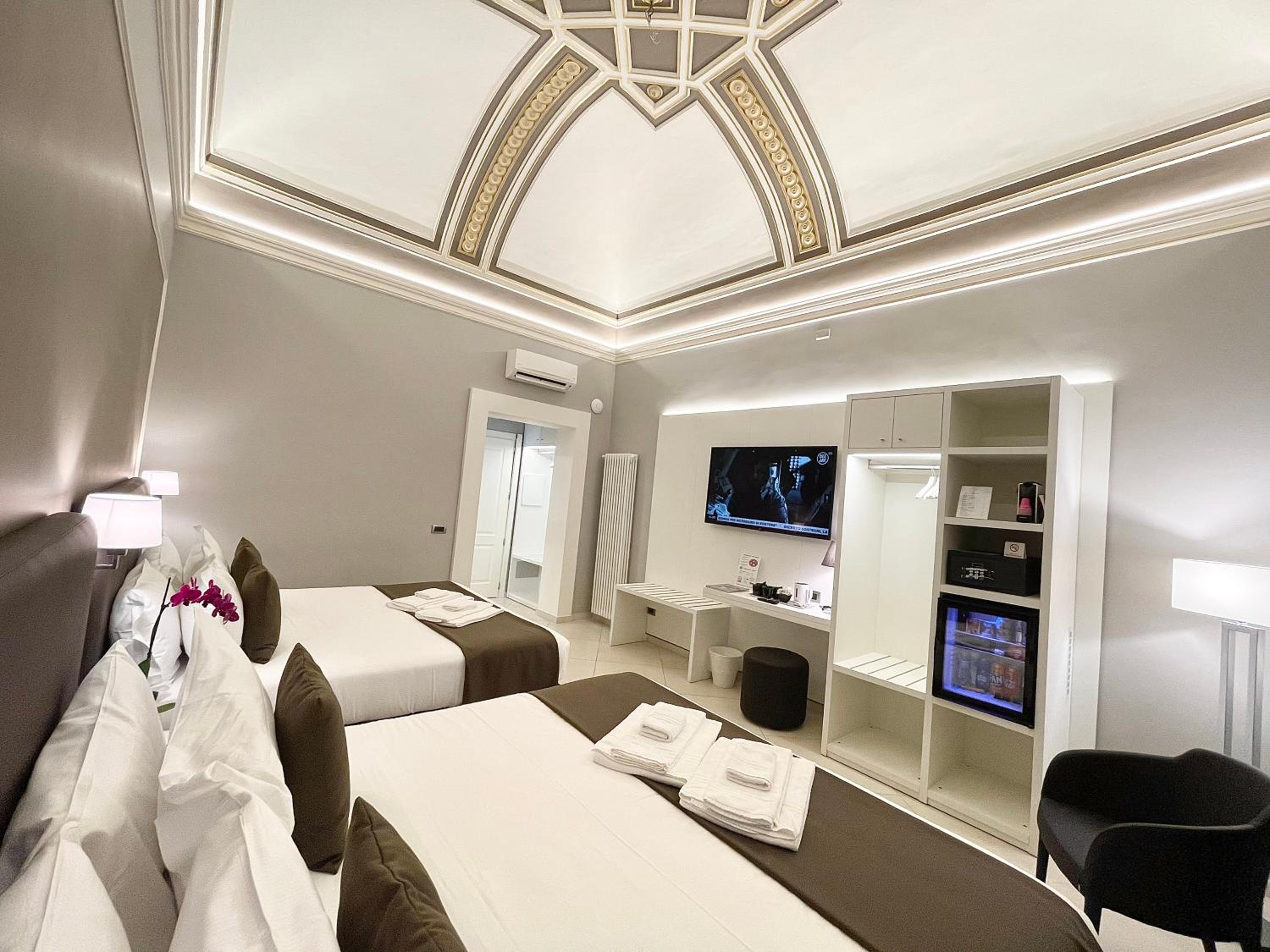 Deluxe Queen Room with Two Queen Beds - Photo 1