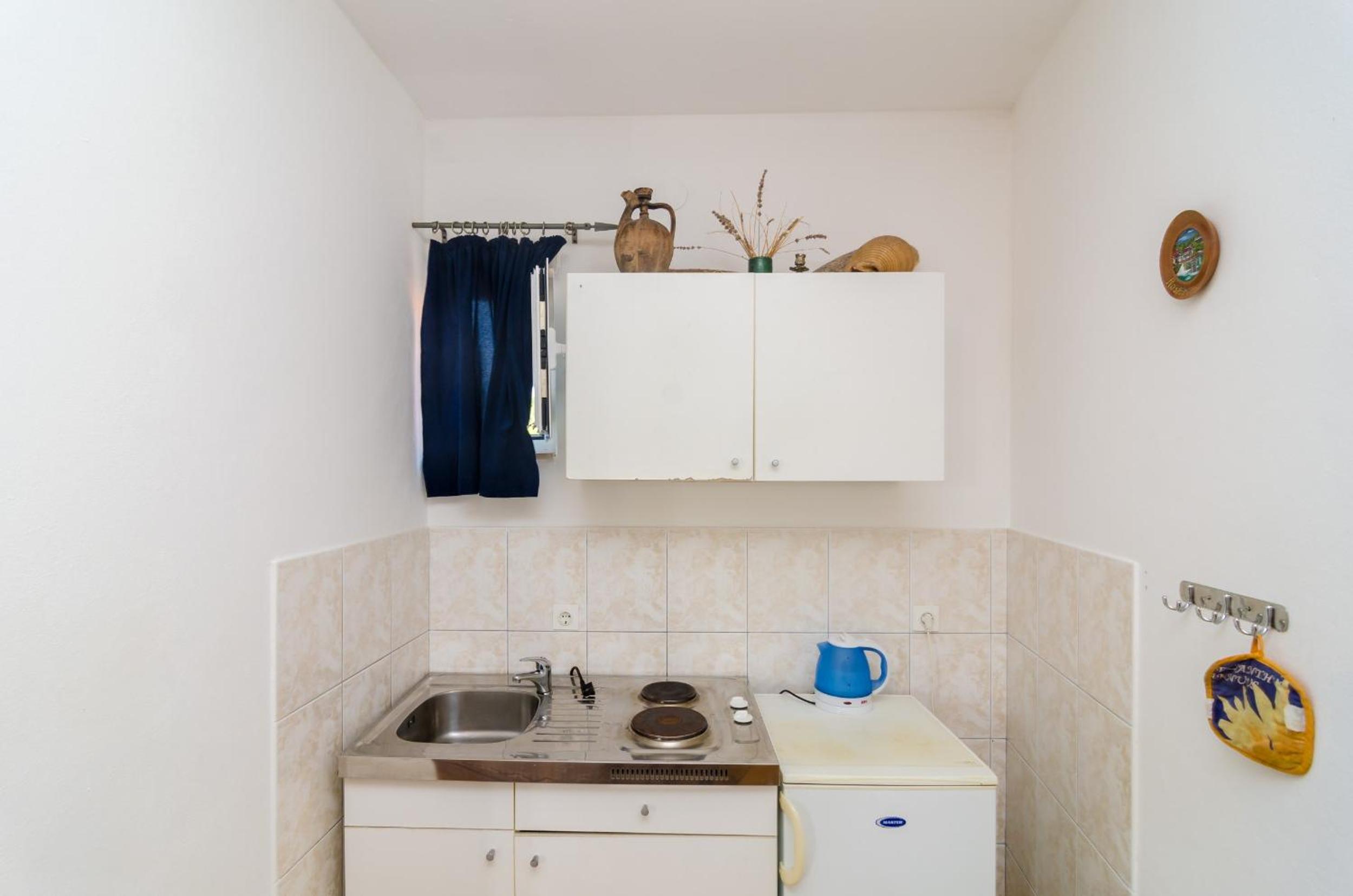 Studio Apartment with Patio - Photo 12