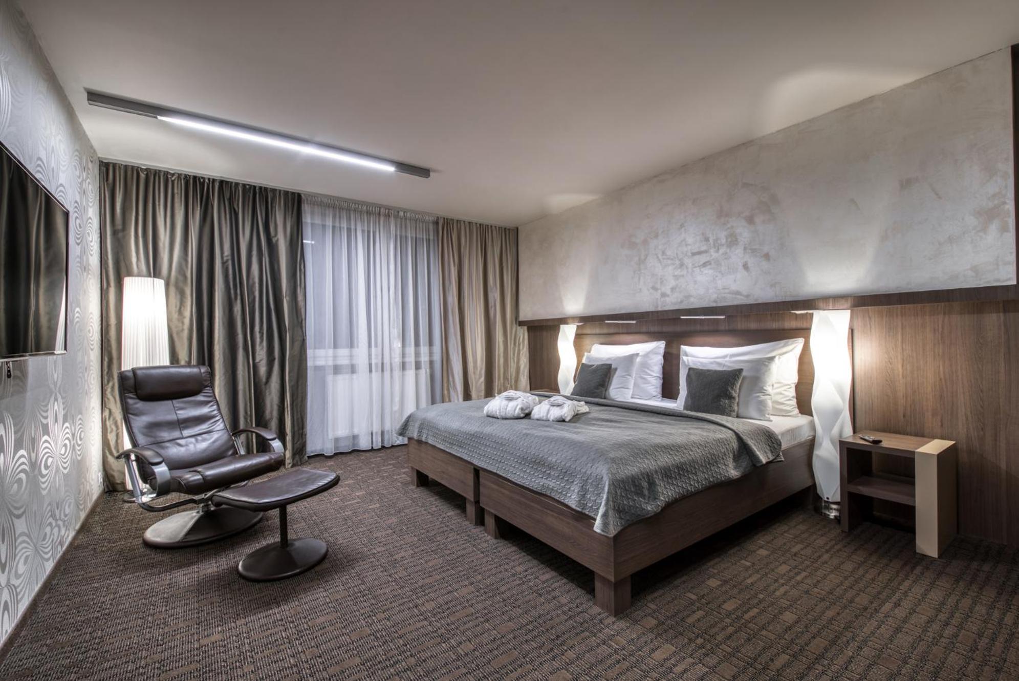 Deluxe Quadruple Room with Free Access to Wellness and Fitness