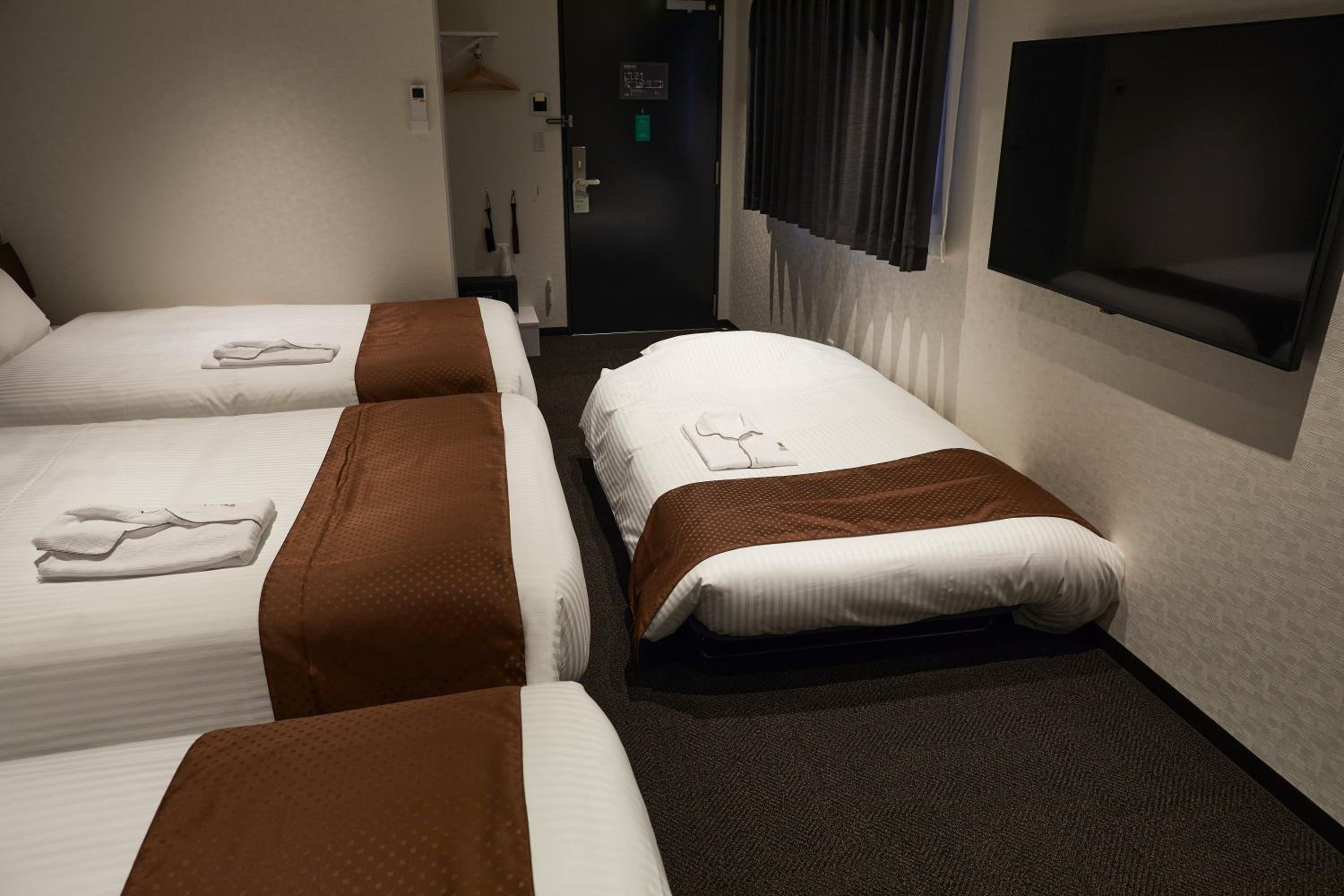 Deluxe Triple Room - Photo 7