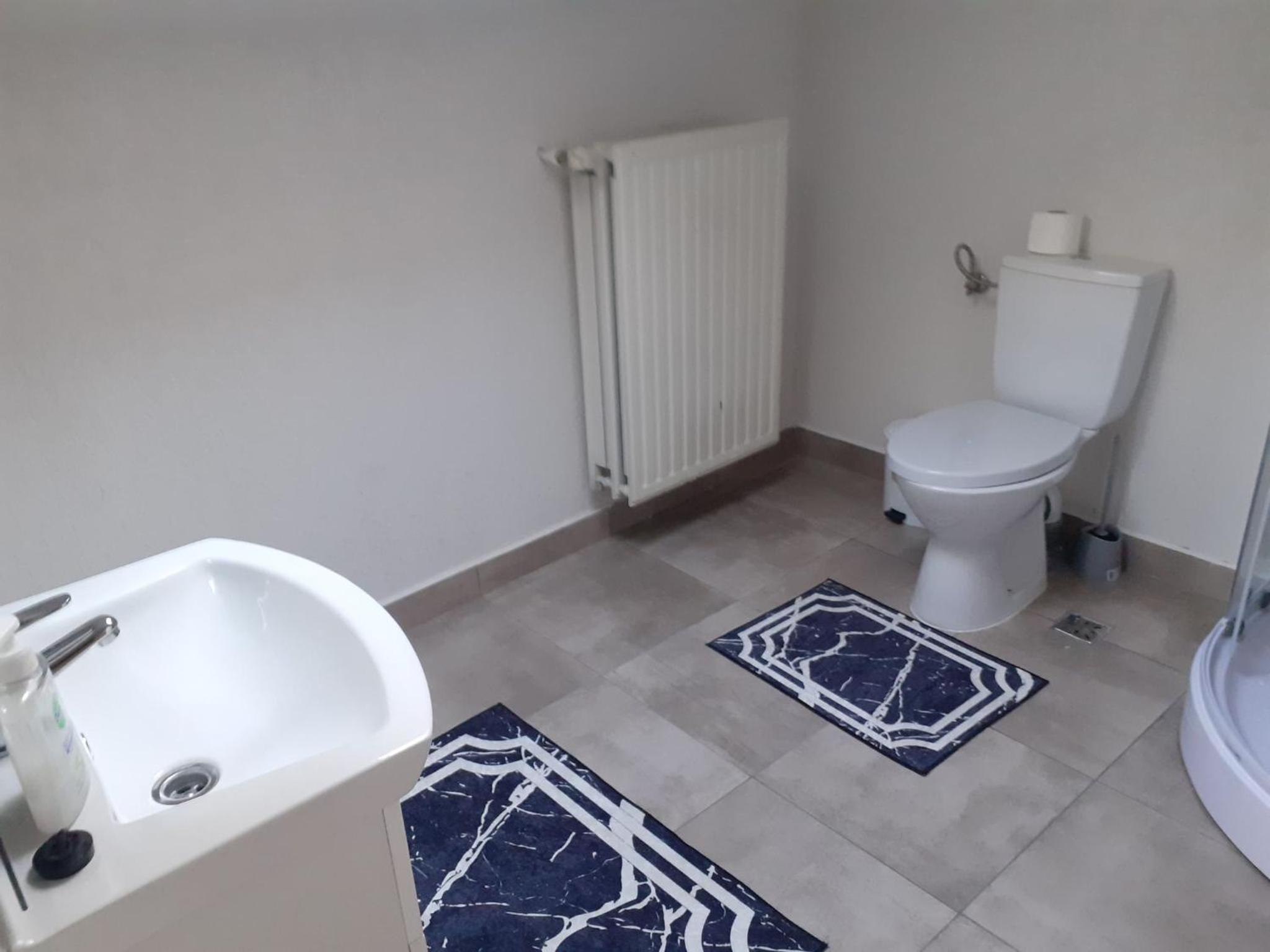 Two-Bedroom Apartment - Photo 32
