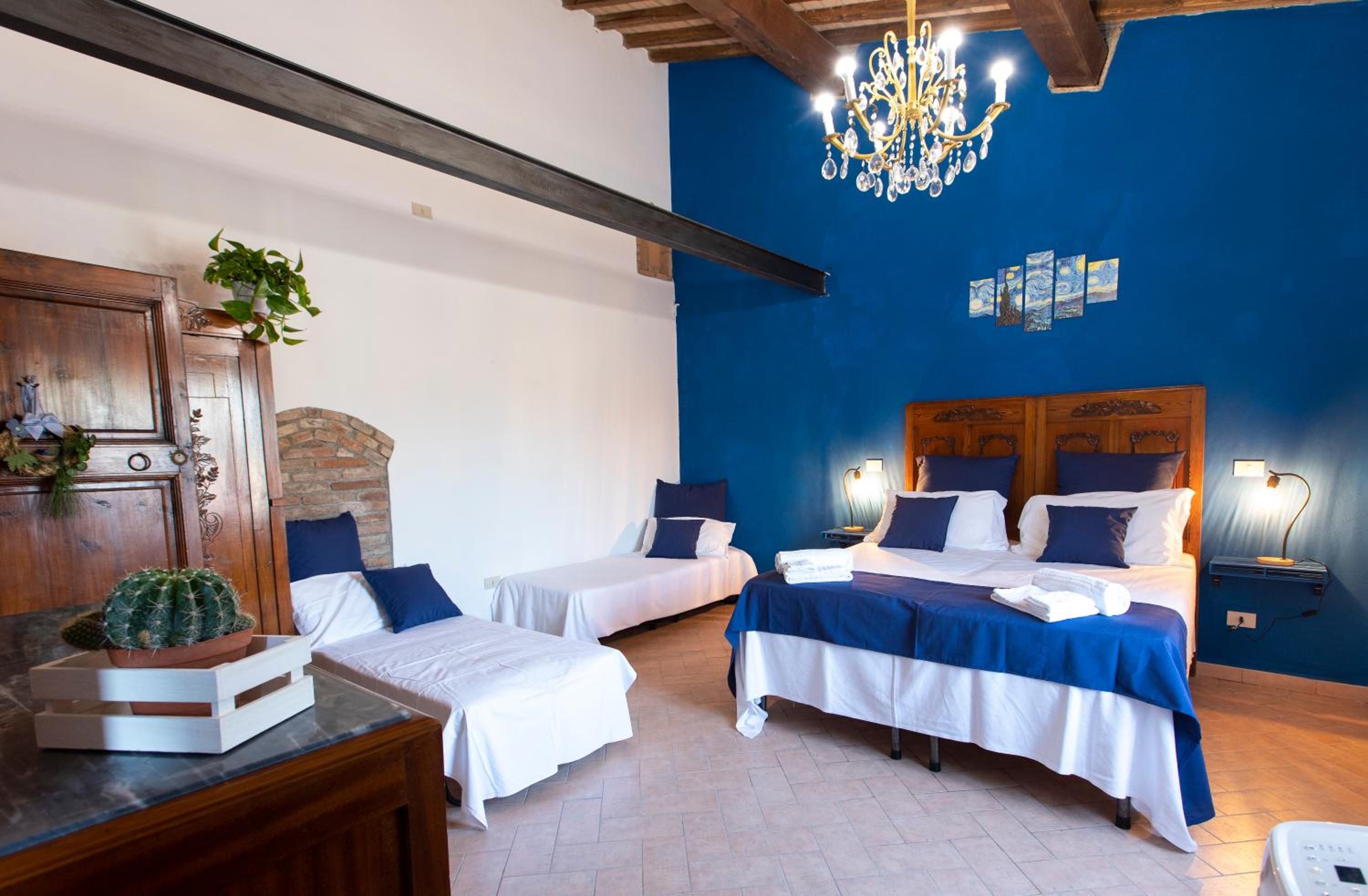 Quadruple Room with Private Bathroom - Photo 1