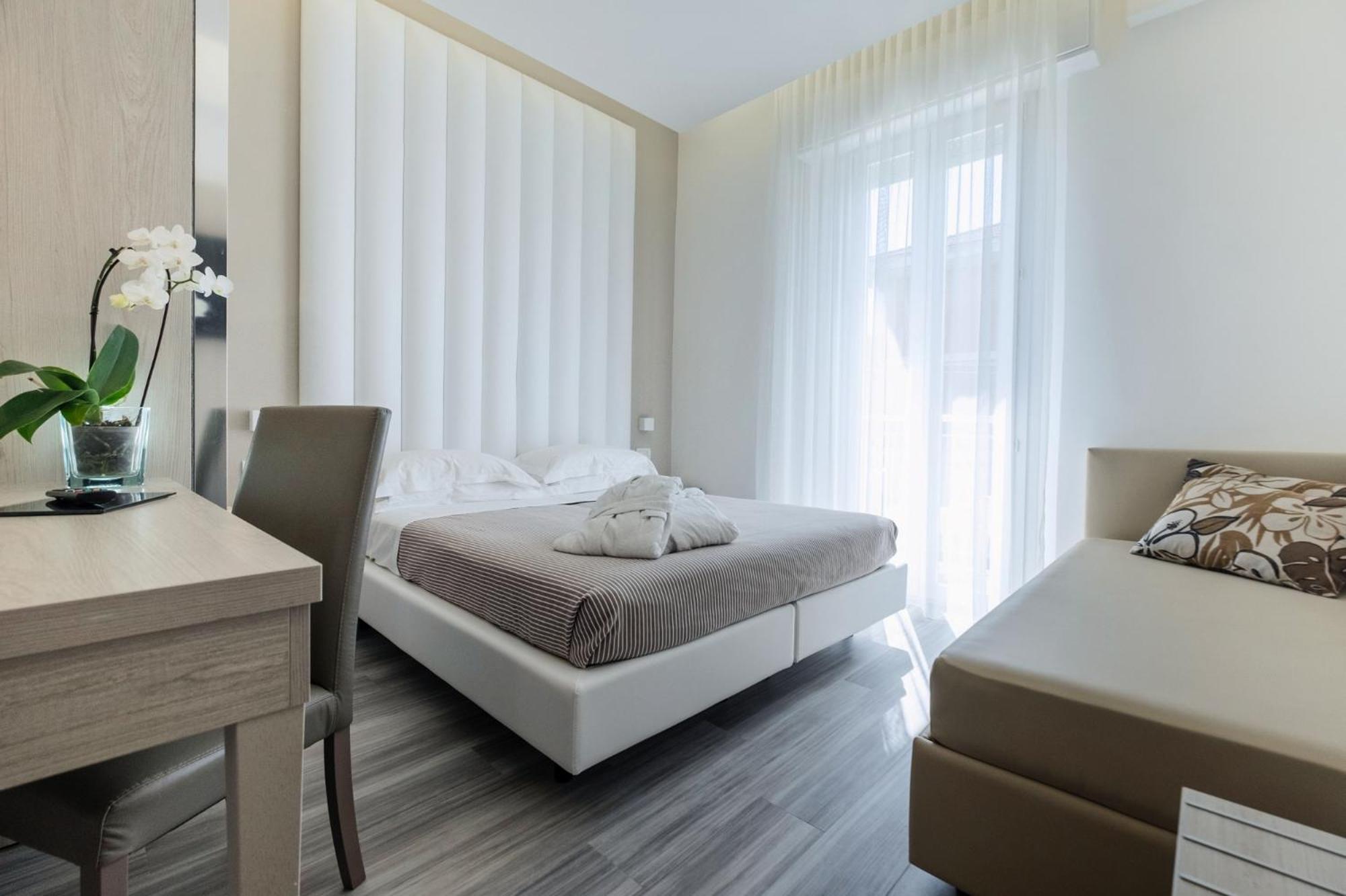 Deluxe Quadruple Room - Photo 14