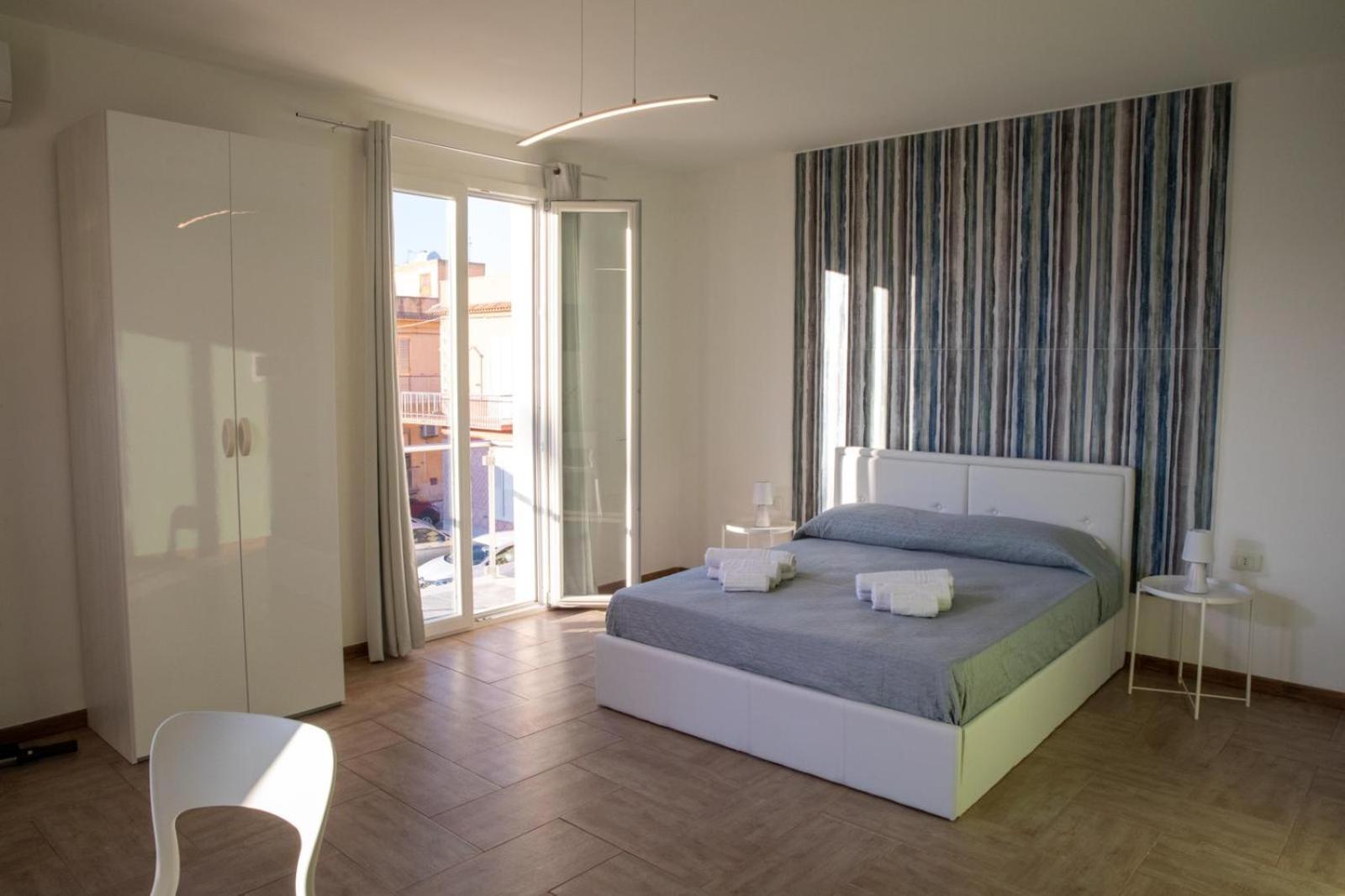 Quadruple Room with Balcony - Photo 1