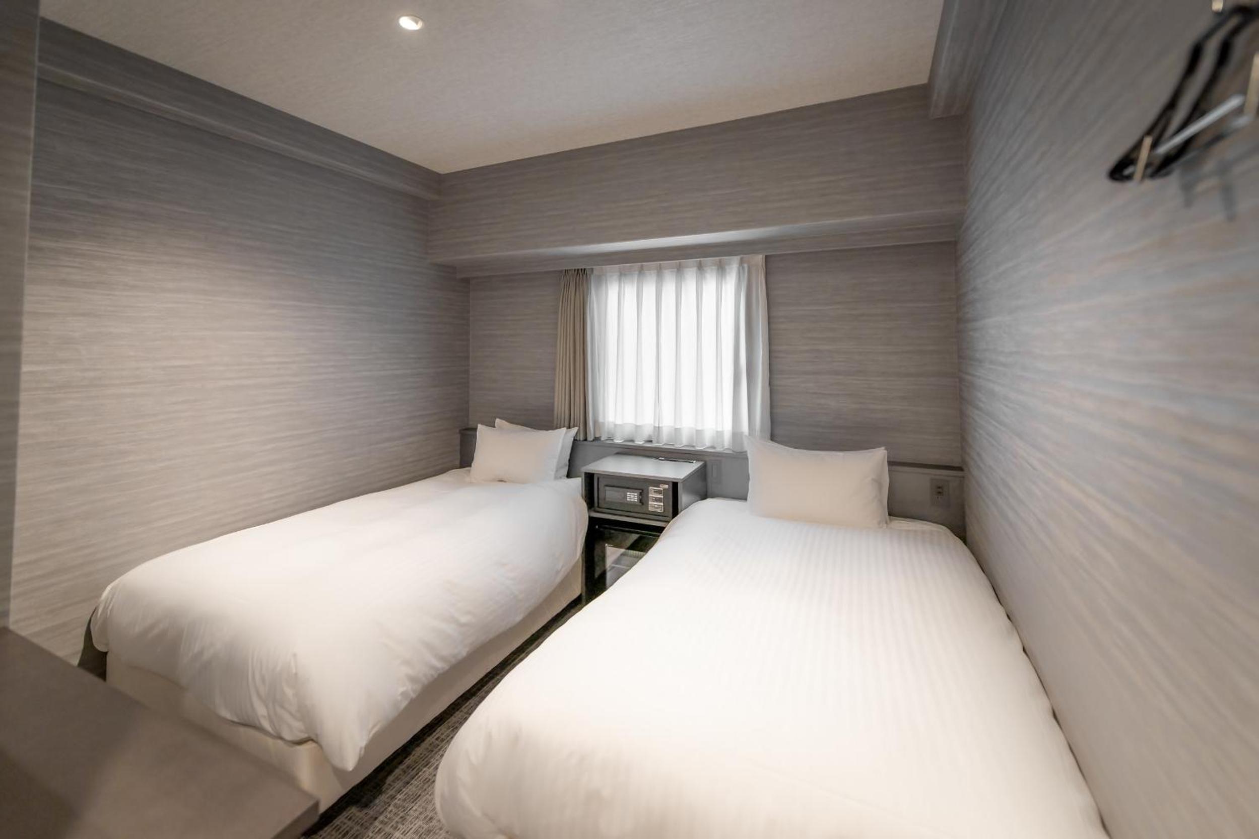 Standard Twin Room - Photo 1