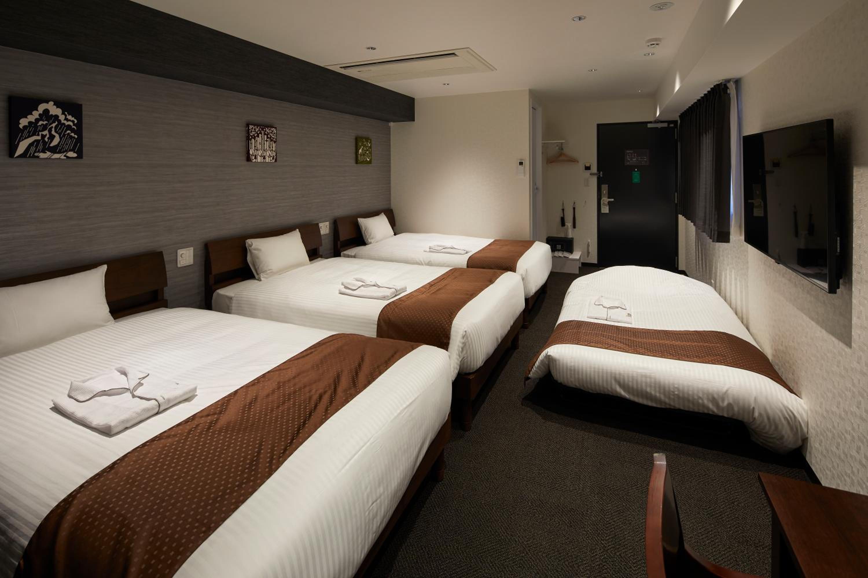 Deluxe Triple Room - Photo 6