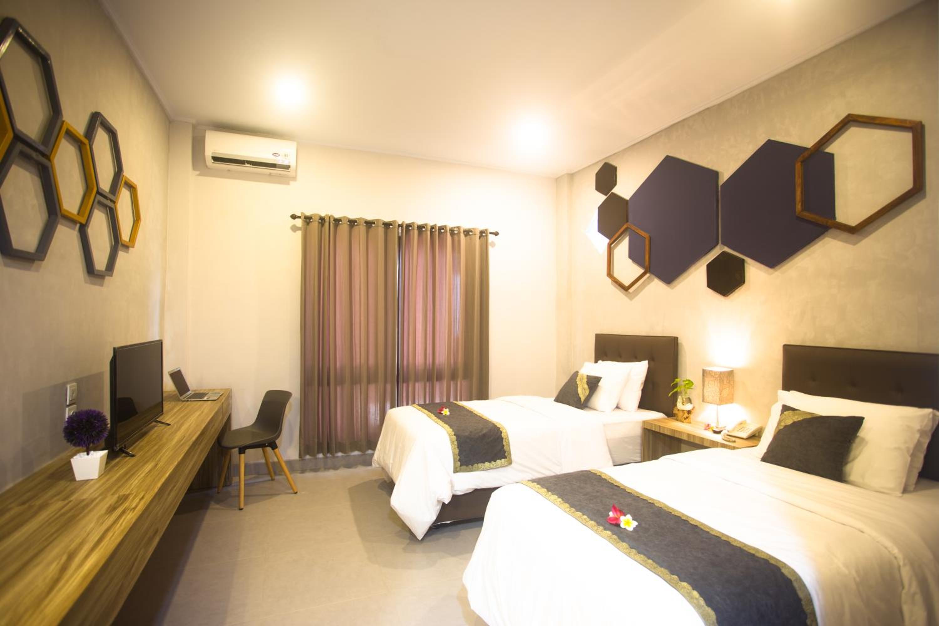 Deluxe Triple Room - Photo 18