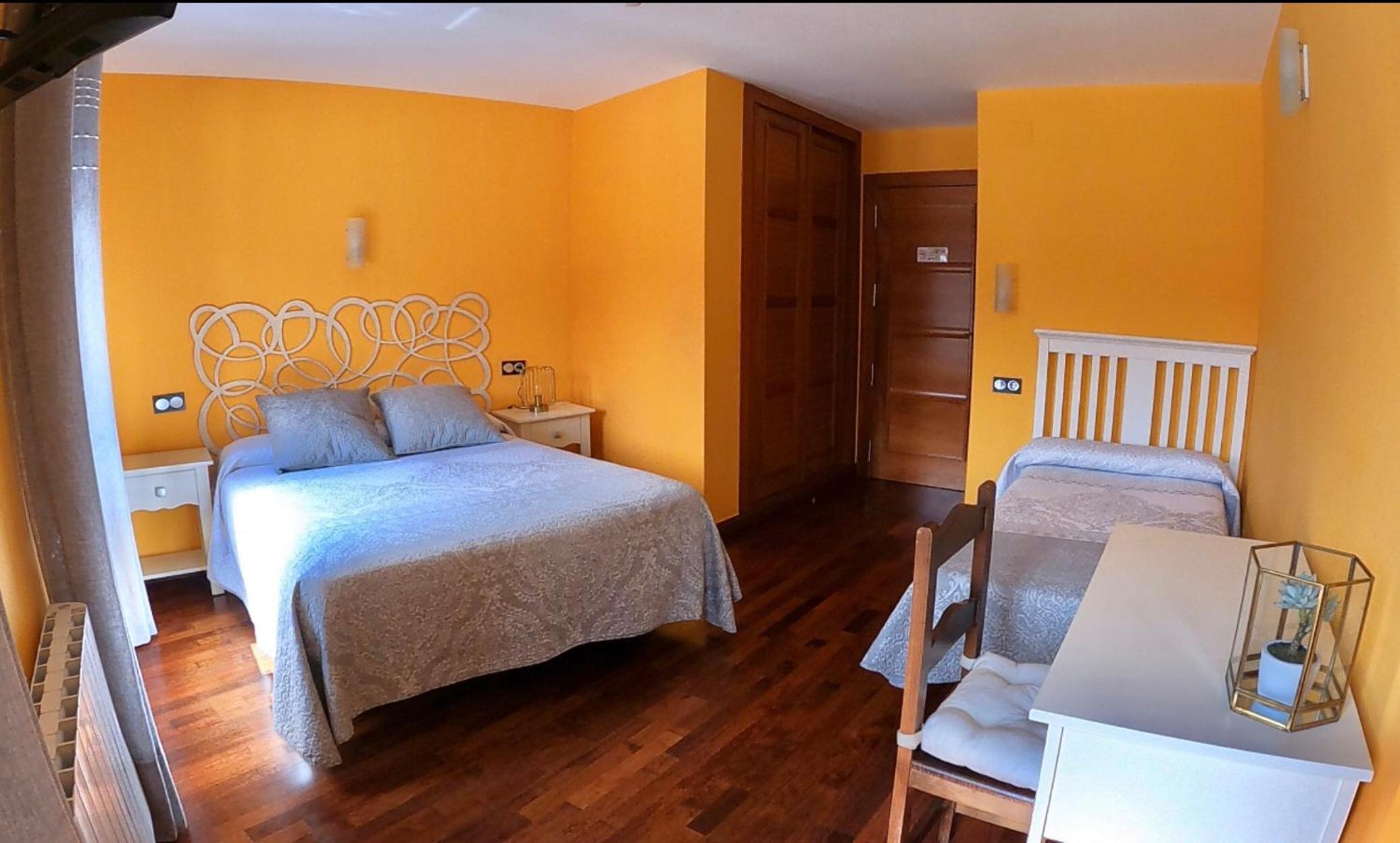 Habitación Deluxe (2 adultos + 1 niño) con baño privado