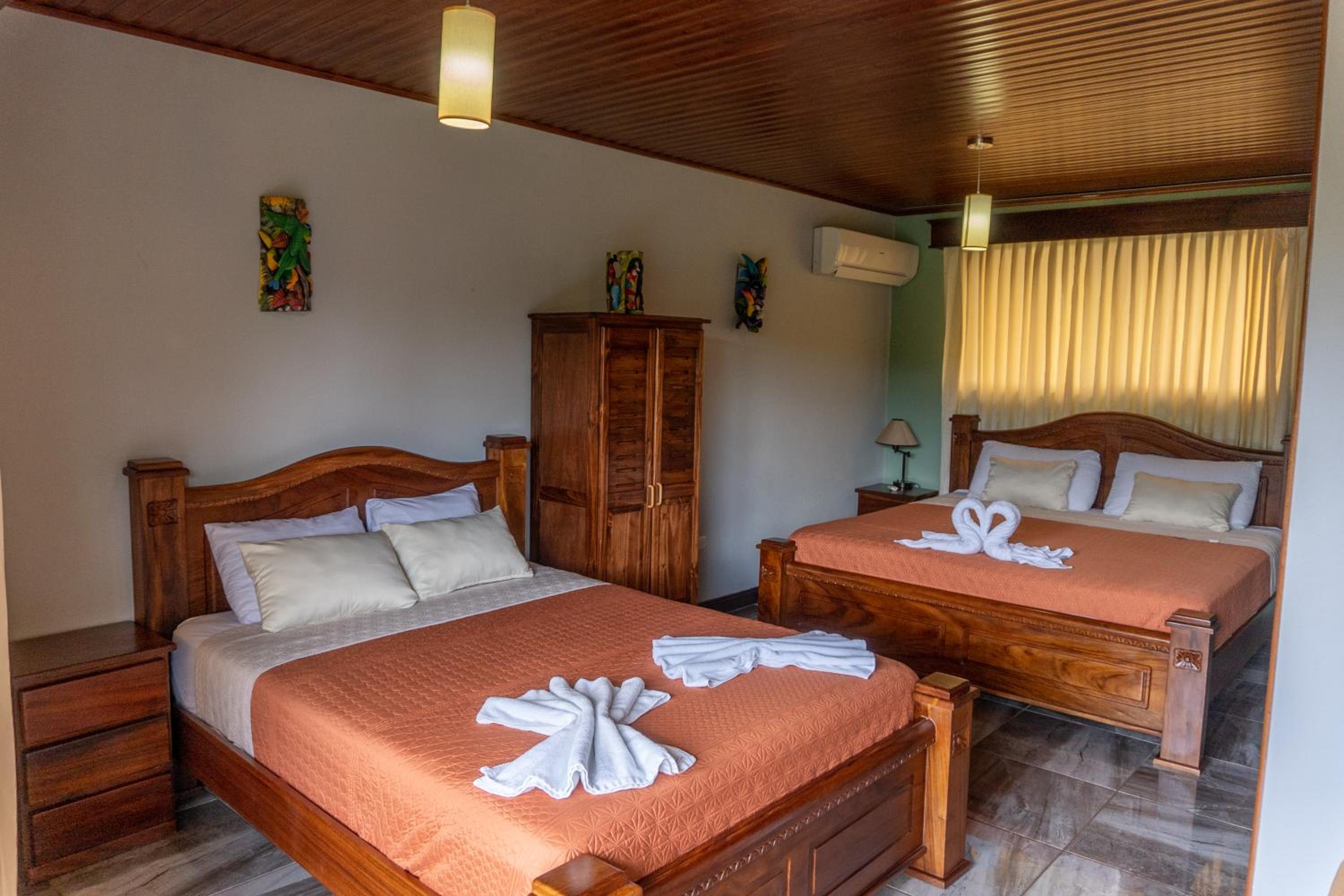 Superior room with 1 King bed and 1 Double bed - Private Bathroom