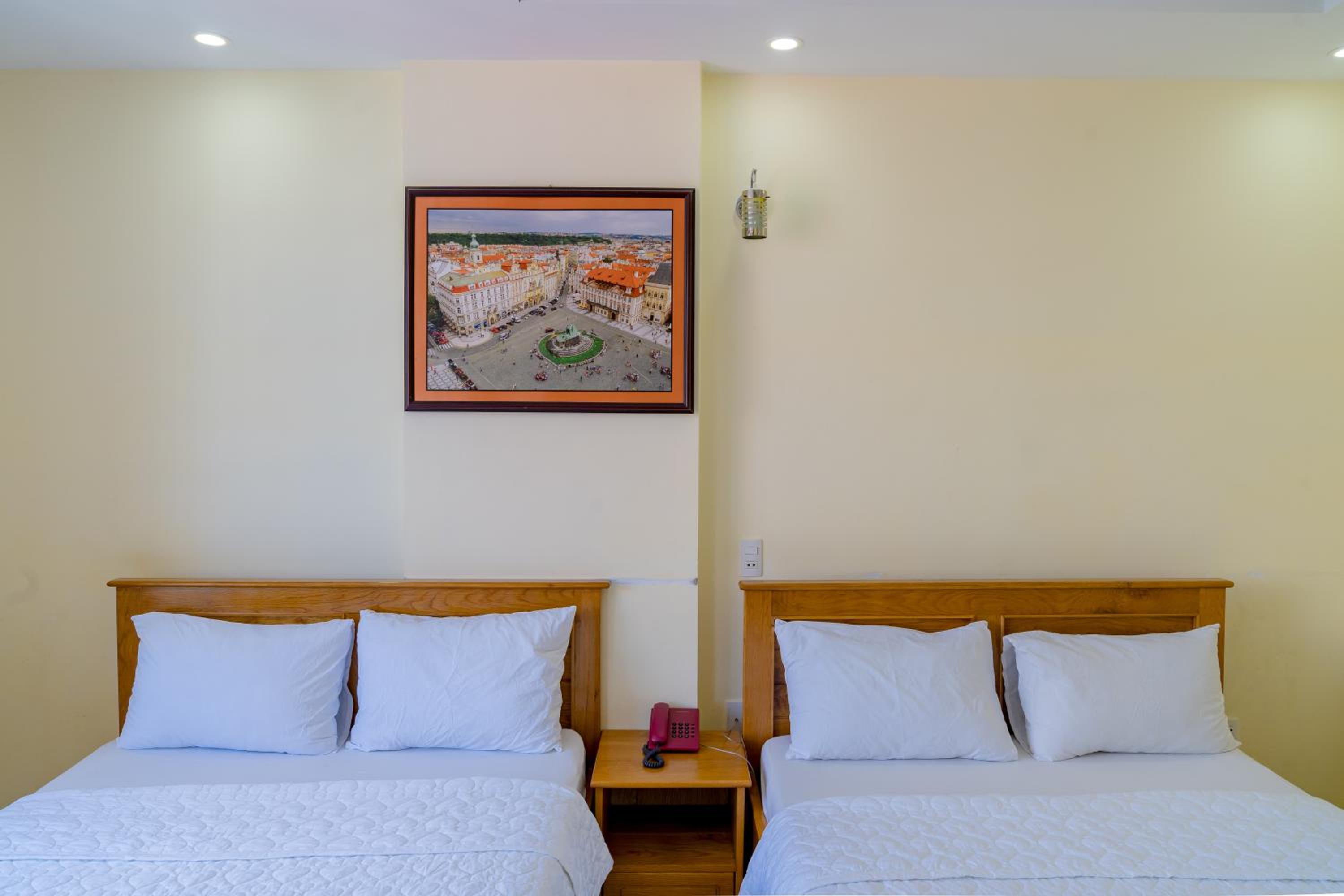 Standard Quadruple Room - Photo 7