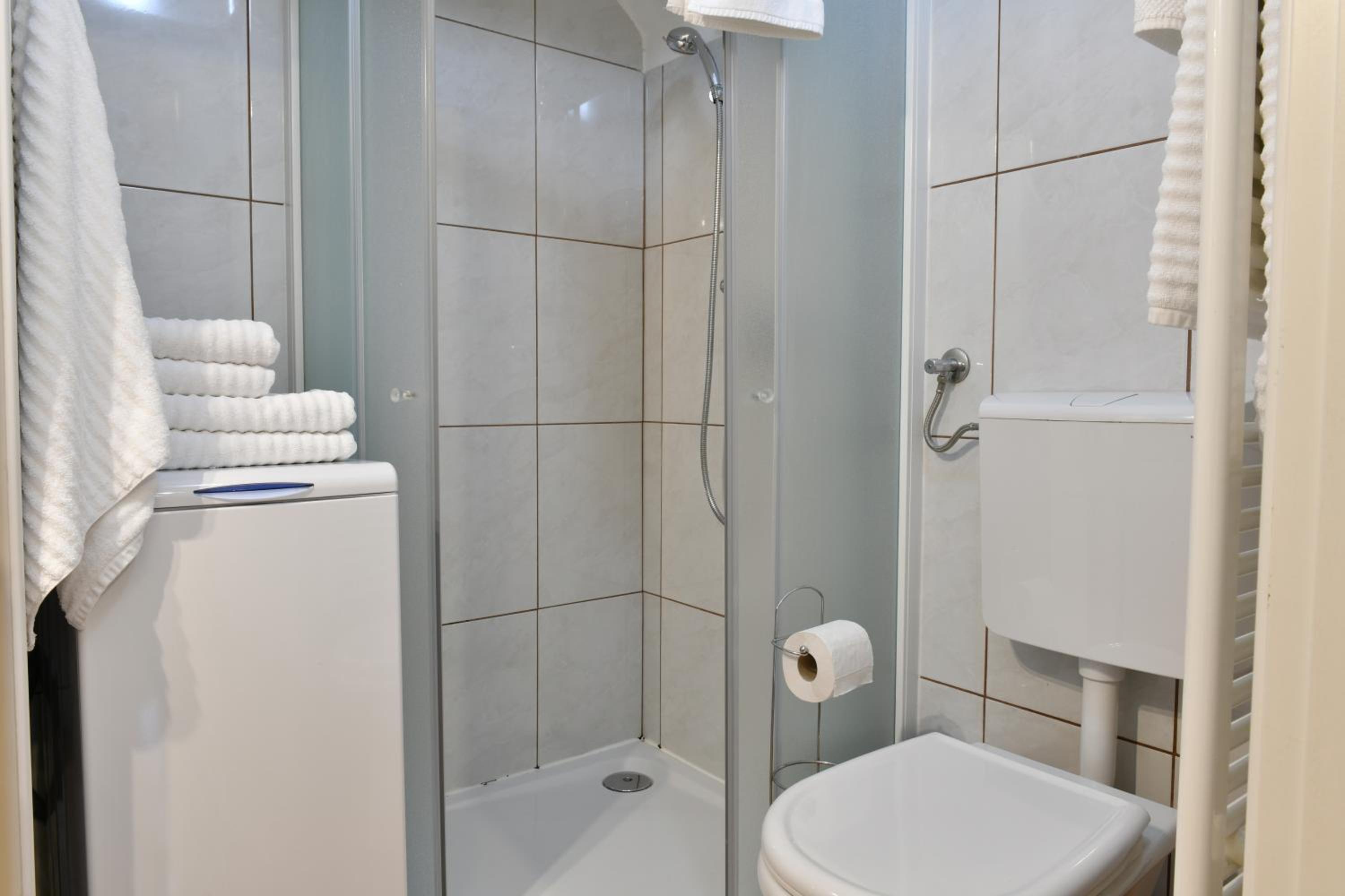 Three-Bedroom Apartment - Photo 30