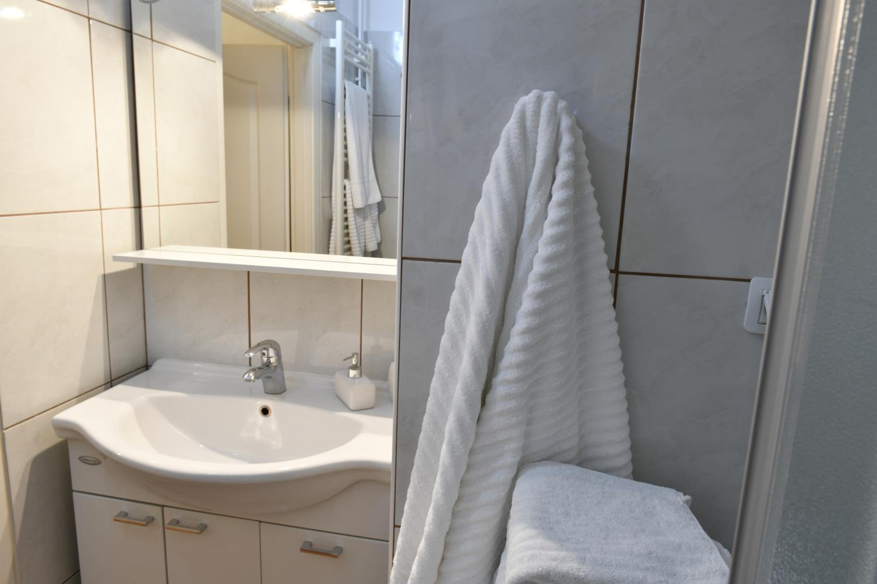 Three-Bedroom Apartment - Photo 31