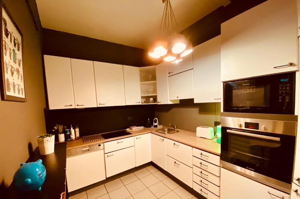 Three-Bedroom Apartment - Photo 2