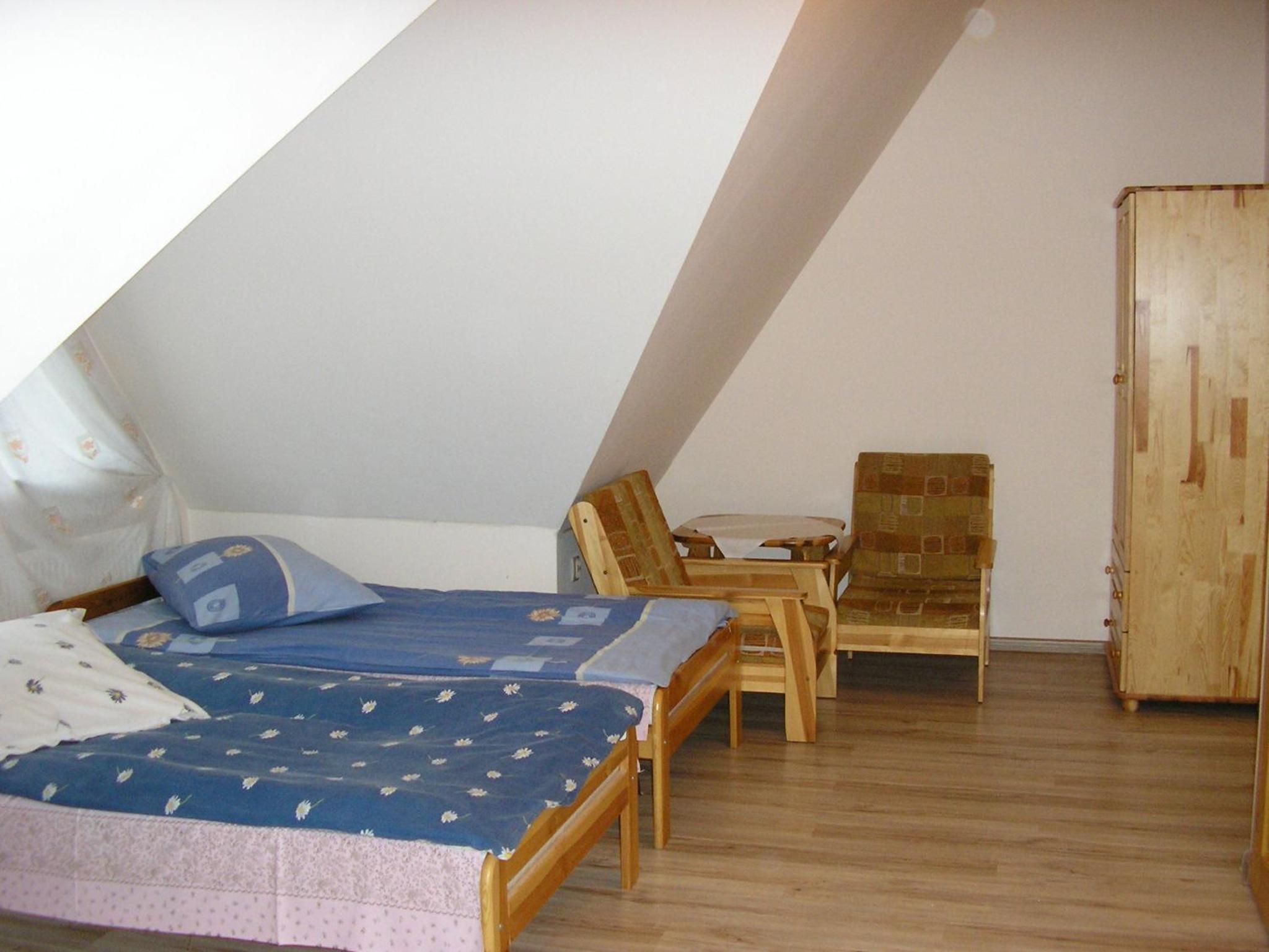 Quadruple Room with Private Bathroom and Balcony - Photo 1