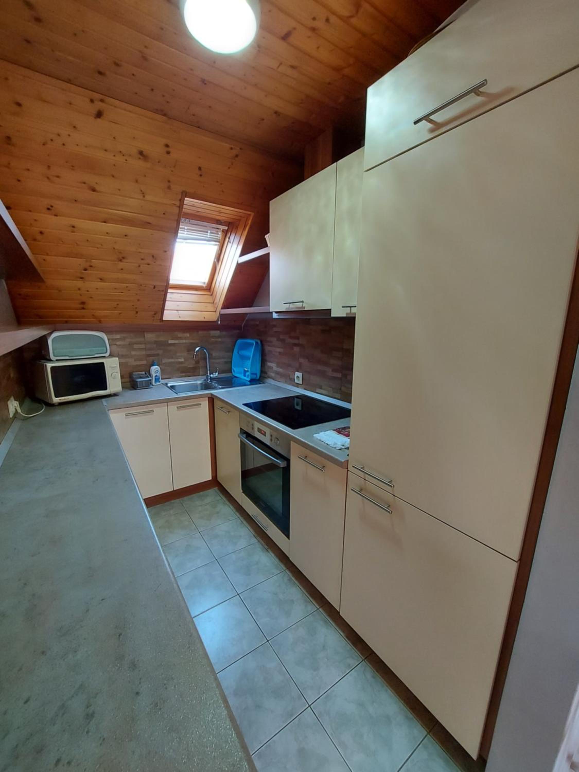 Three-Bedroom Apartment - Photo 18
