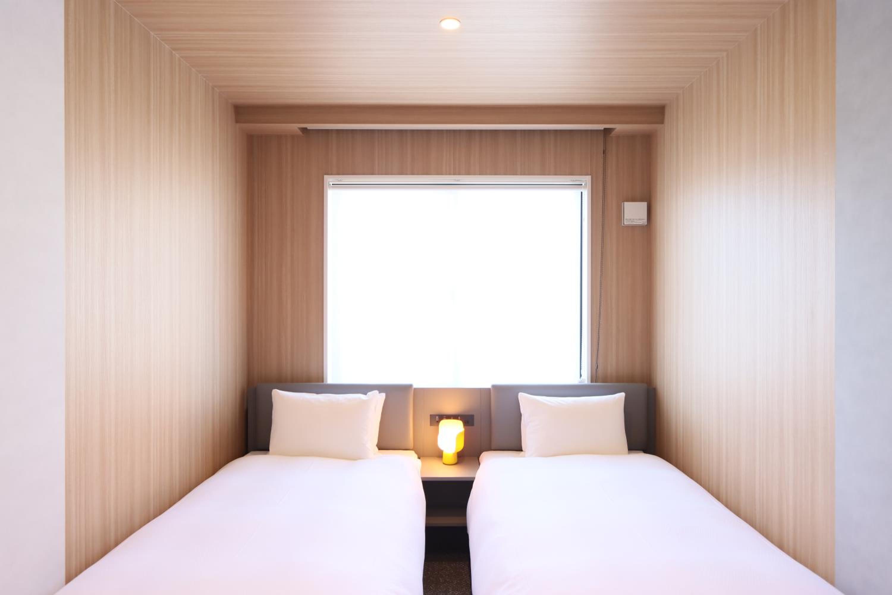 Standard Twin Room - Photo 10