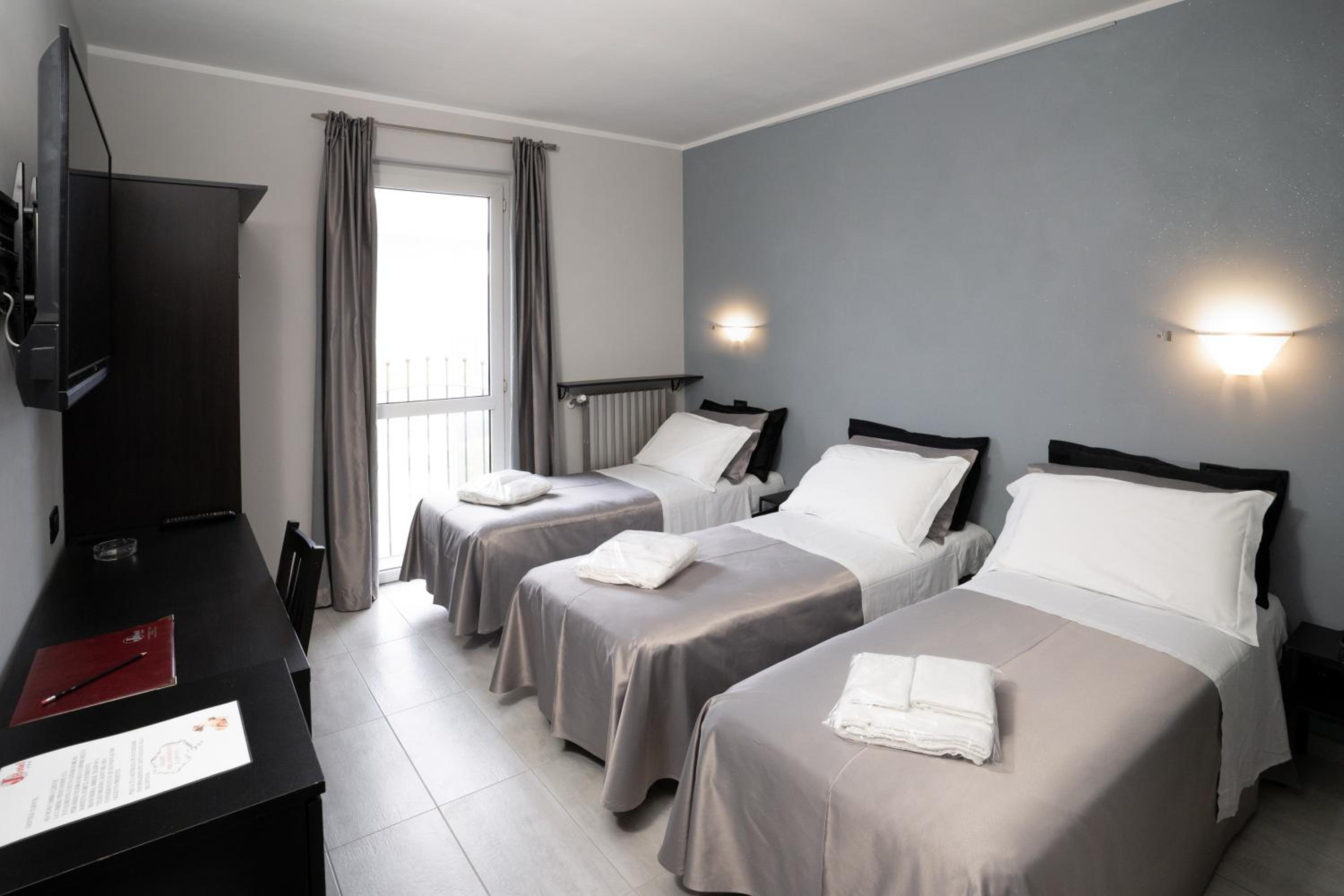 Triple Room - Photo 1