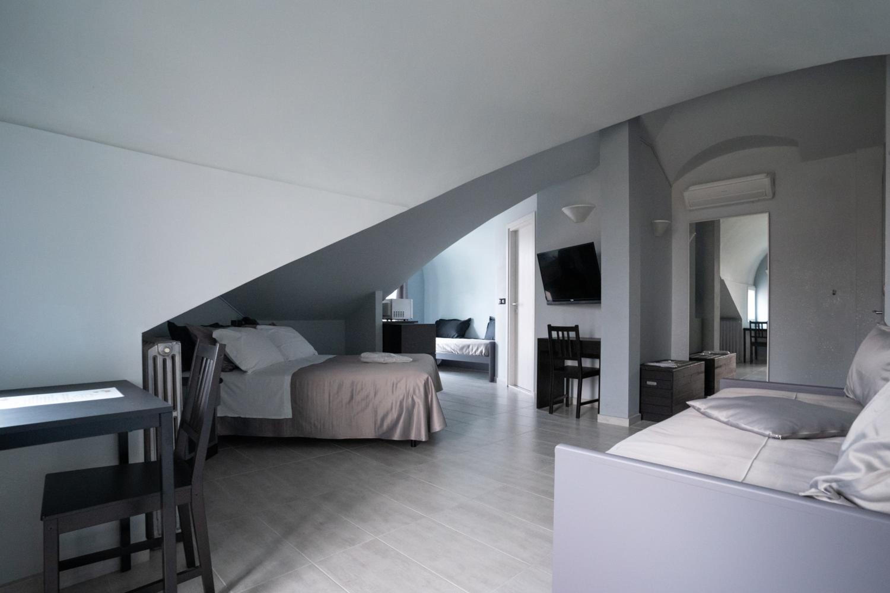 Quadruple Room - Photo 1