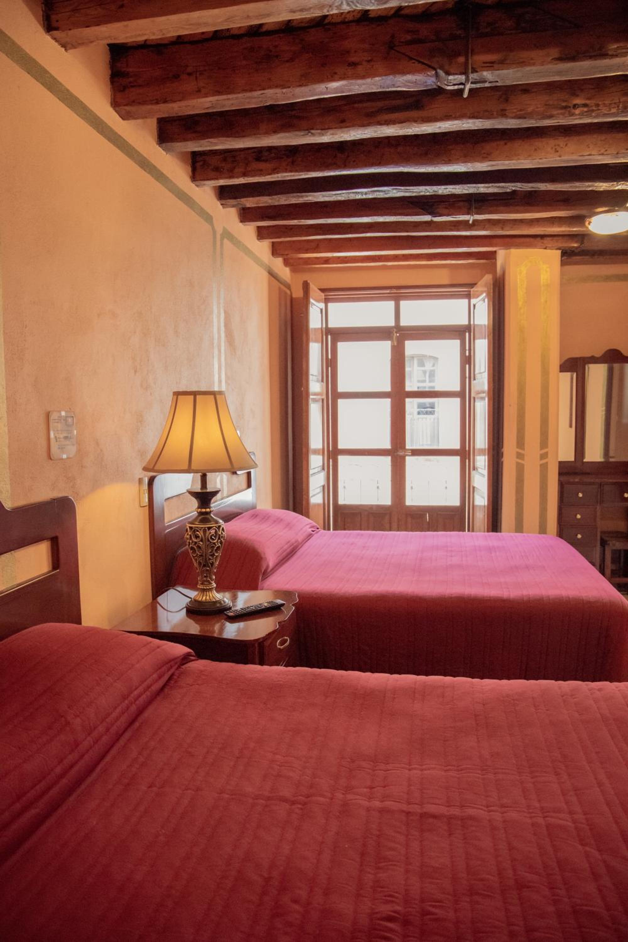 Deluxe Queen Room with Two Queen Beds - Photo 6