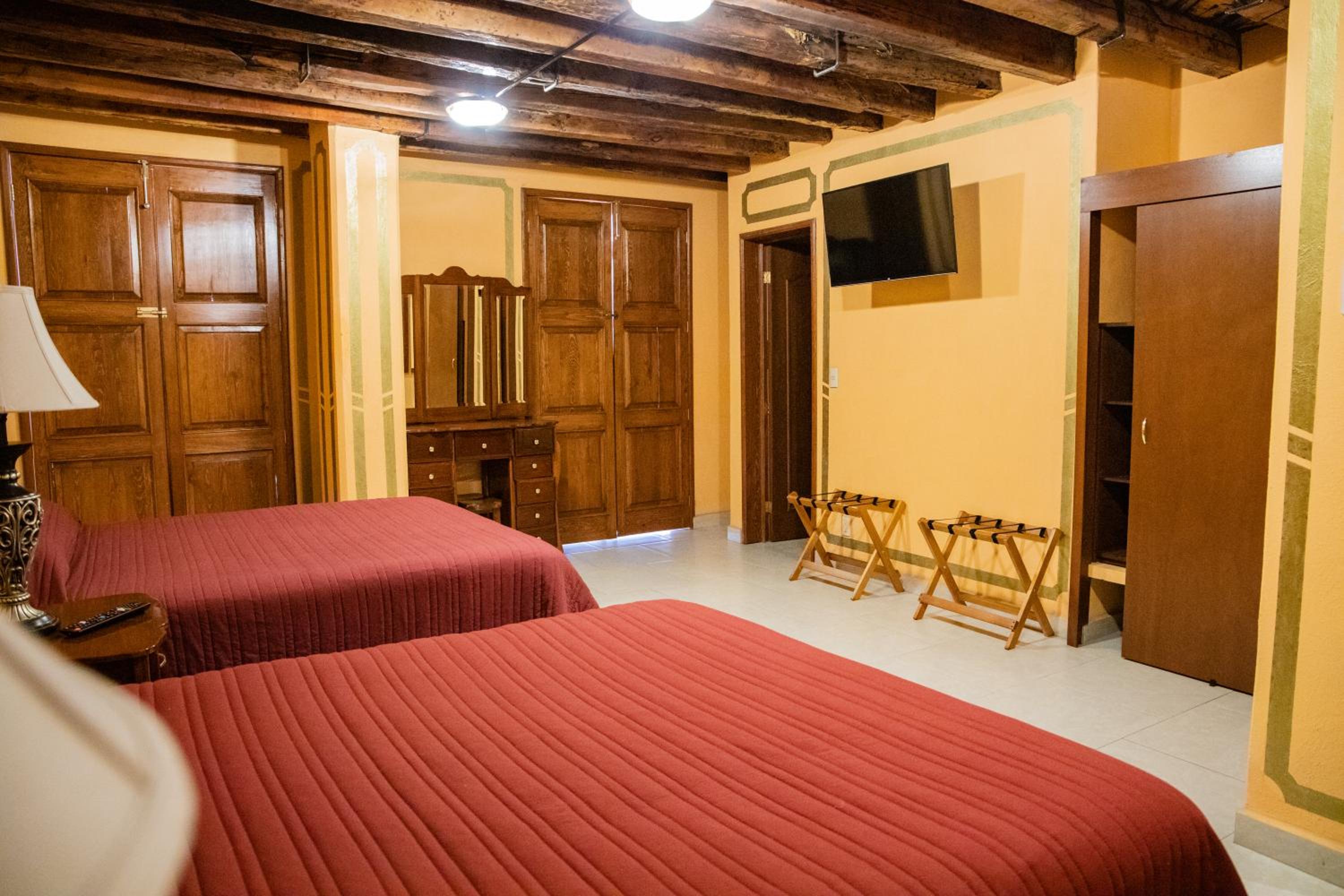 Deluxe Queen Room with Two Queen Beds - Photo 1