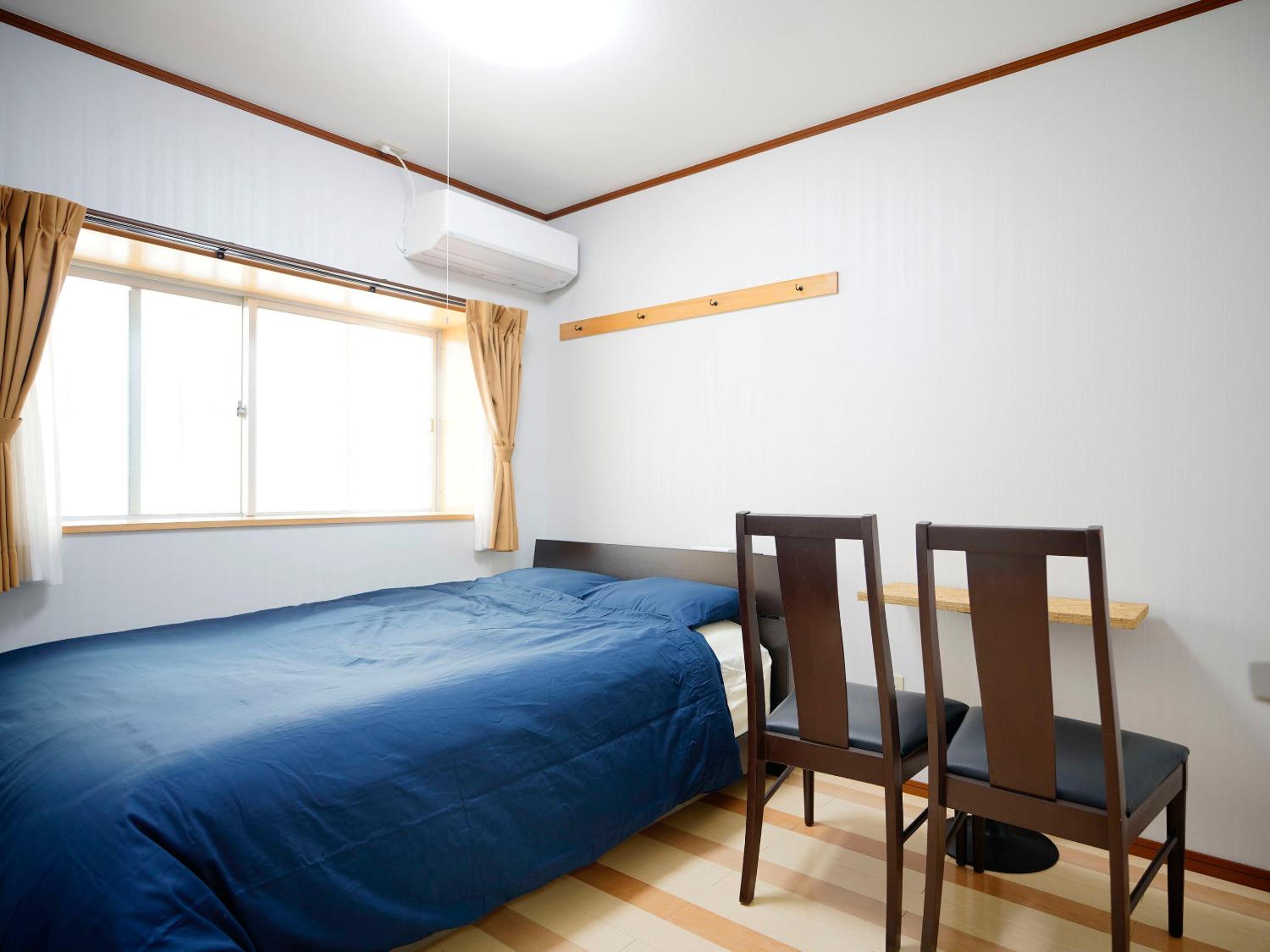 Three-Bedroom Apartment - Photo 15
