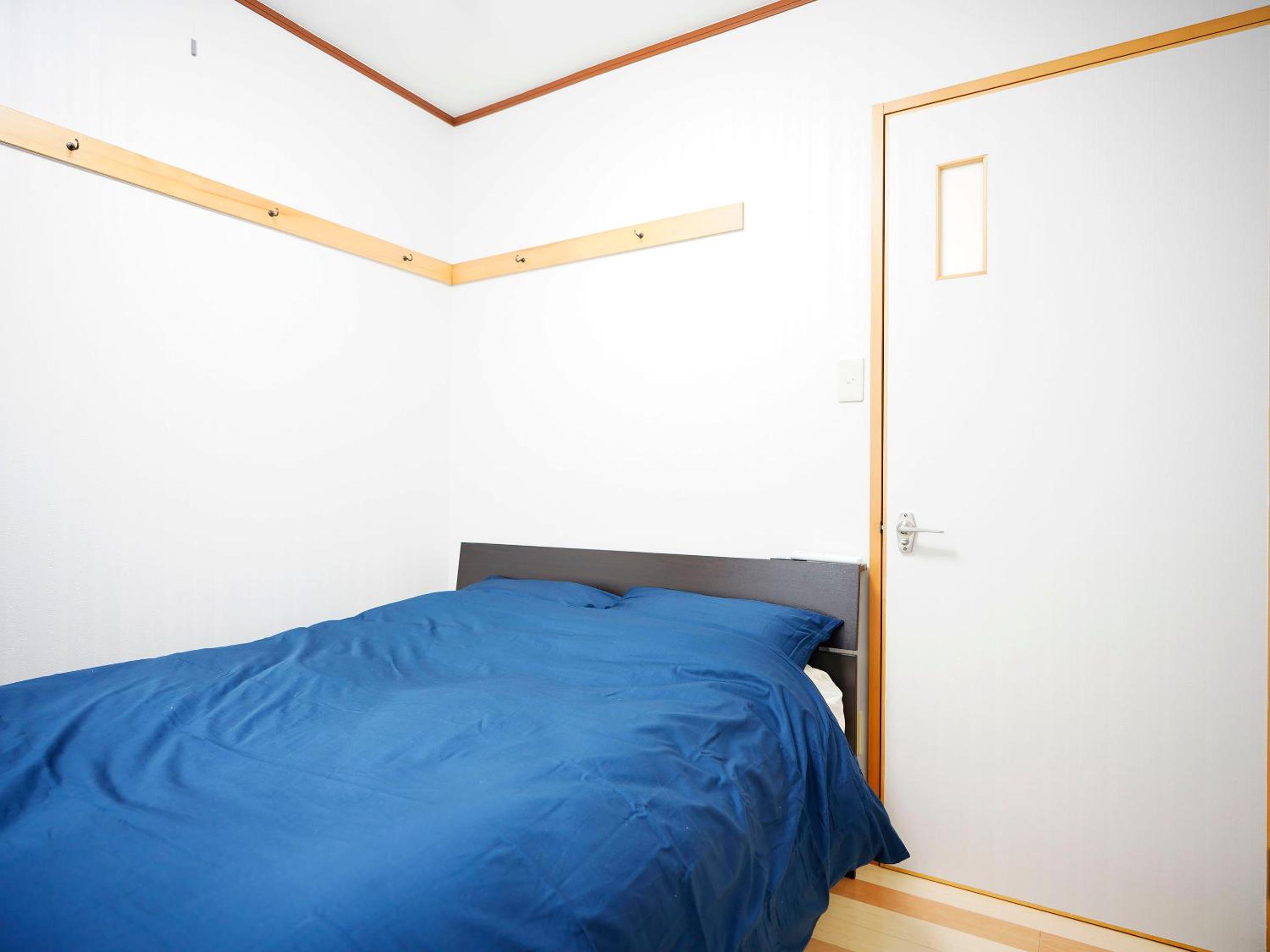 Three-Bedroom Apartment - Photo 13