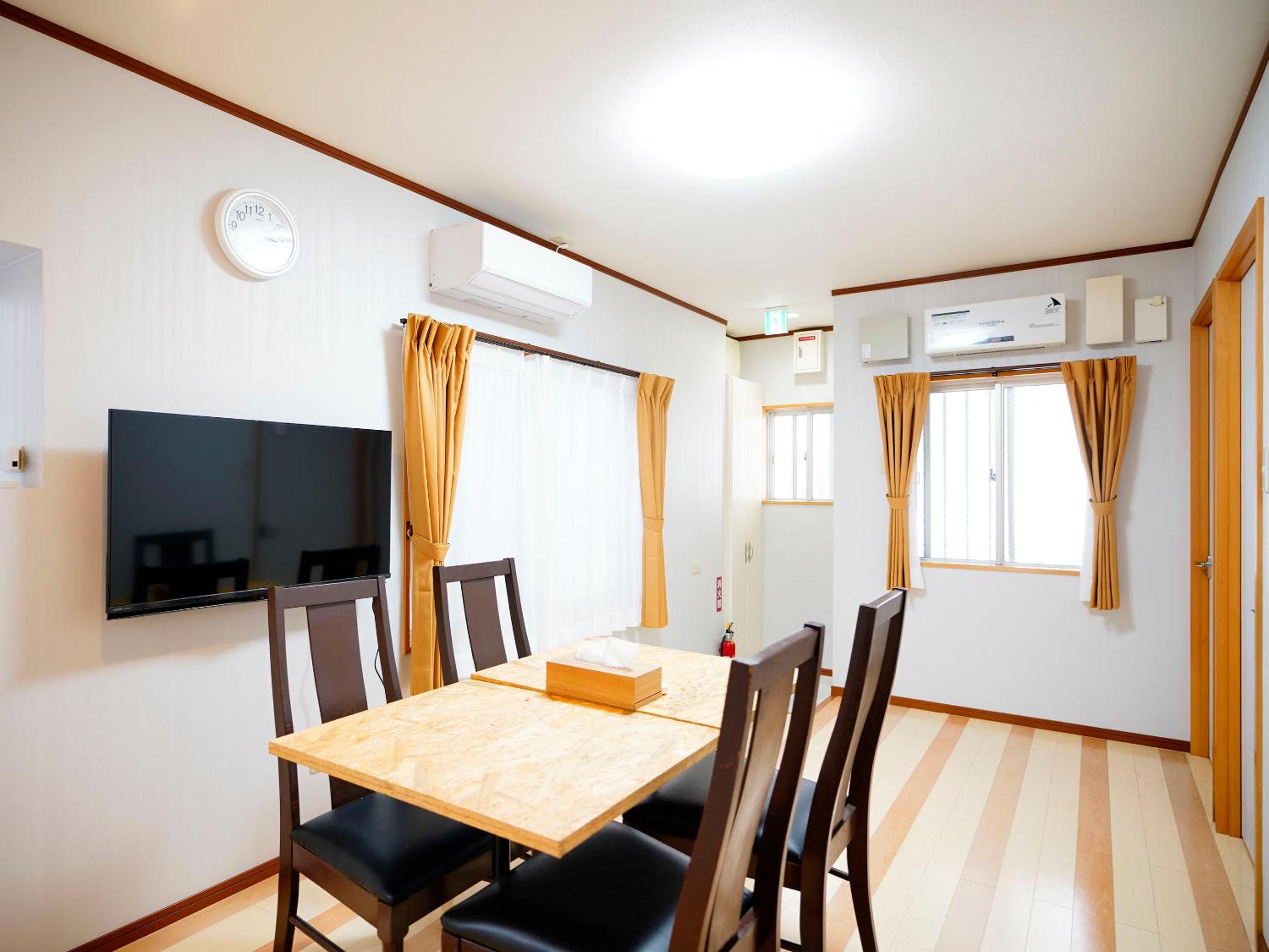 Three-Bedroom Apartment - Photo 12