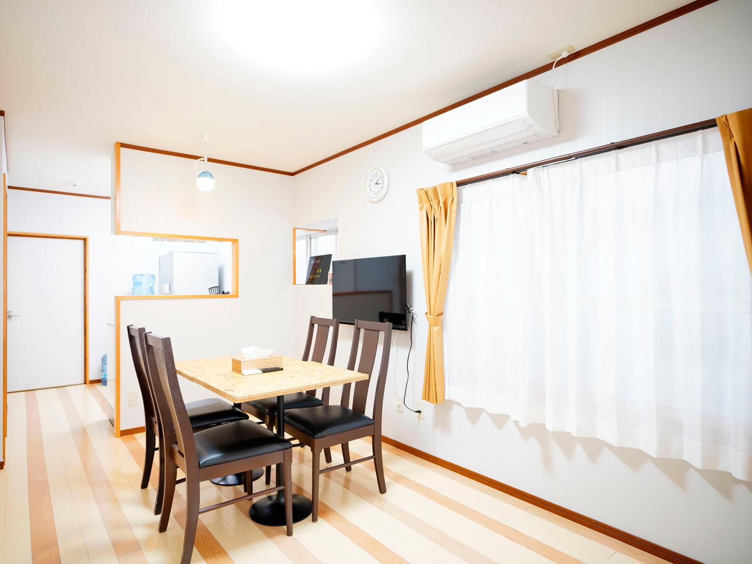 Three-Bedroom Apartment - Photo 11